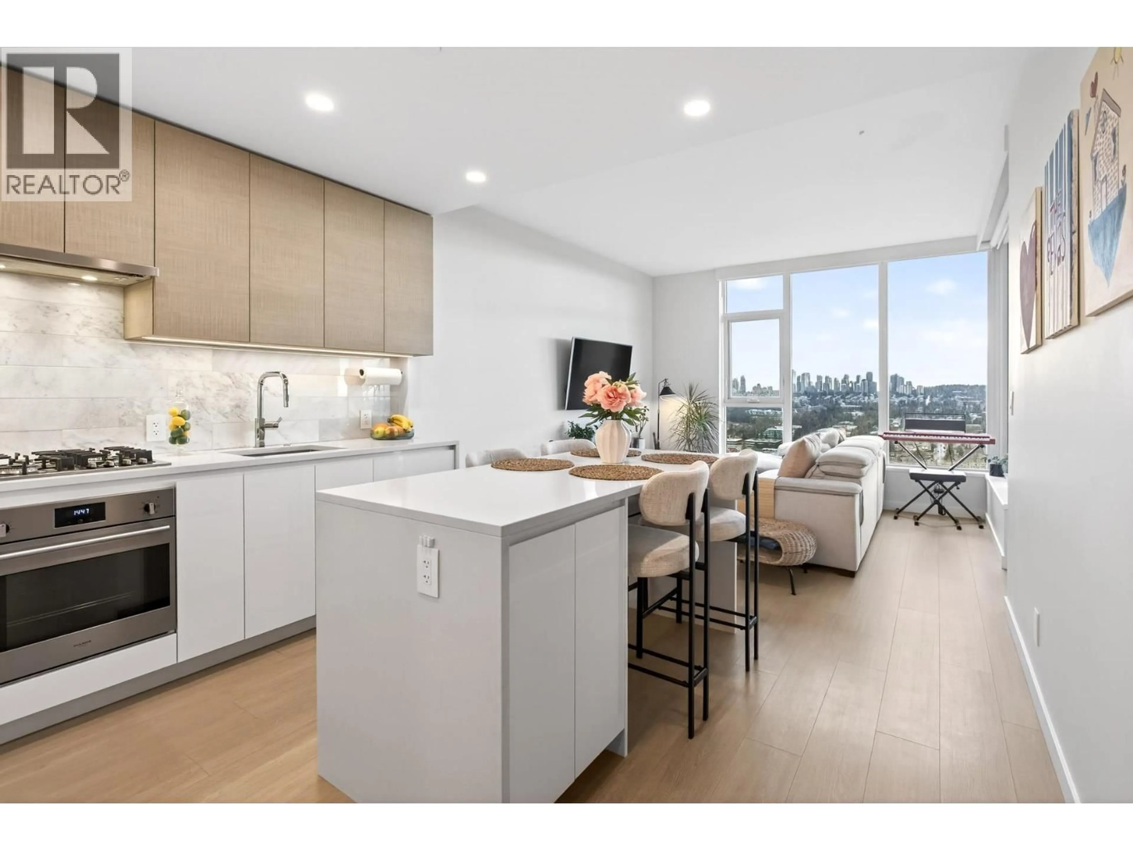 Open concept kitchen, wood/laminate floor for 3706 - 2186 GILMORE AVENUE, Burnaby British Columbia V5C0N7