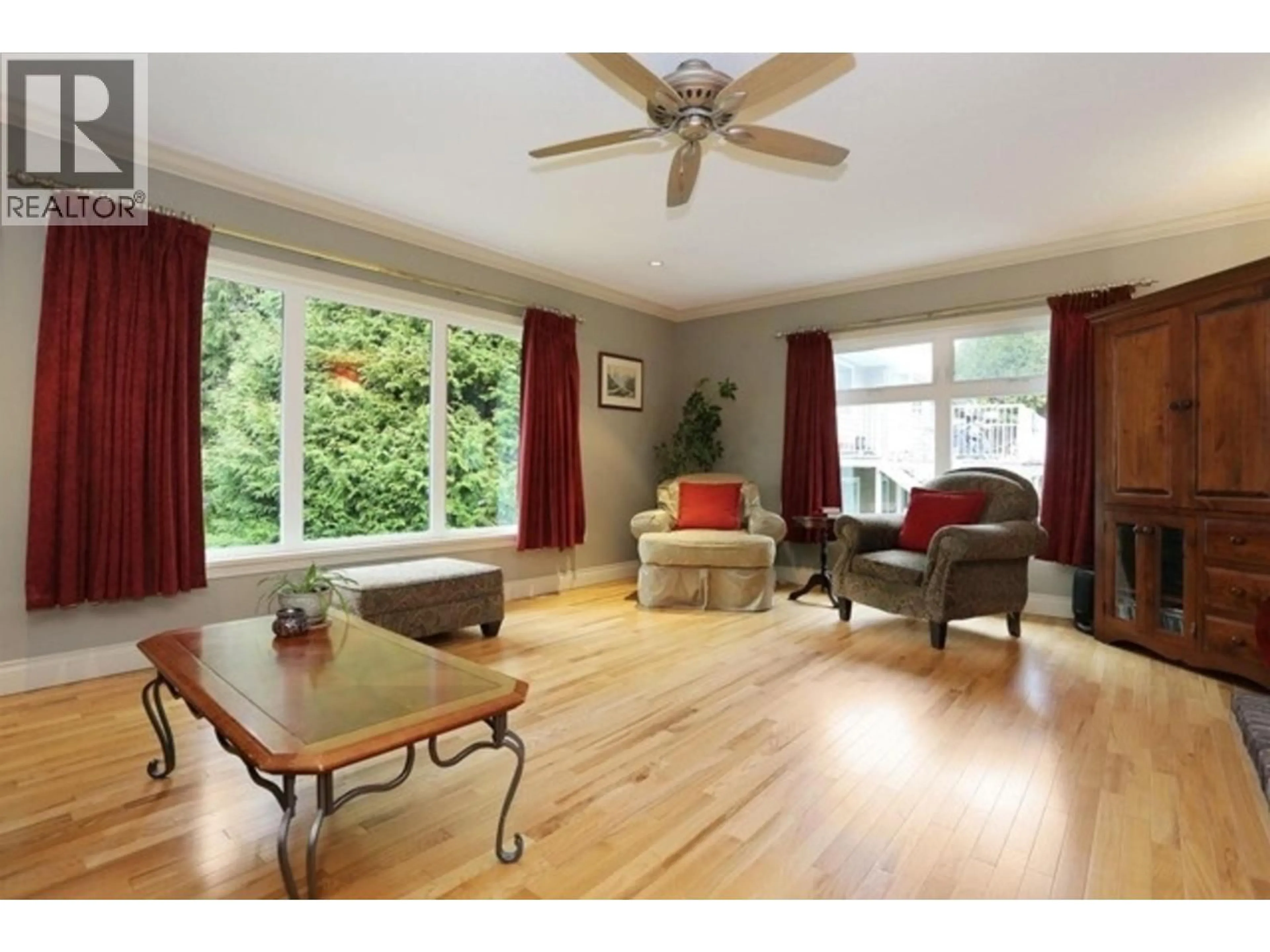 Living room with furniture, wood/laminate floor for 5214 12 AVENUE, Delta British Columbia V4M2A8