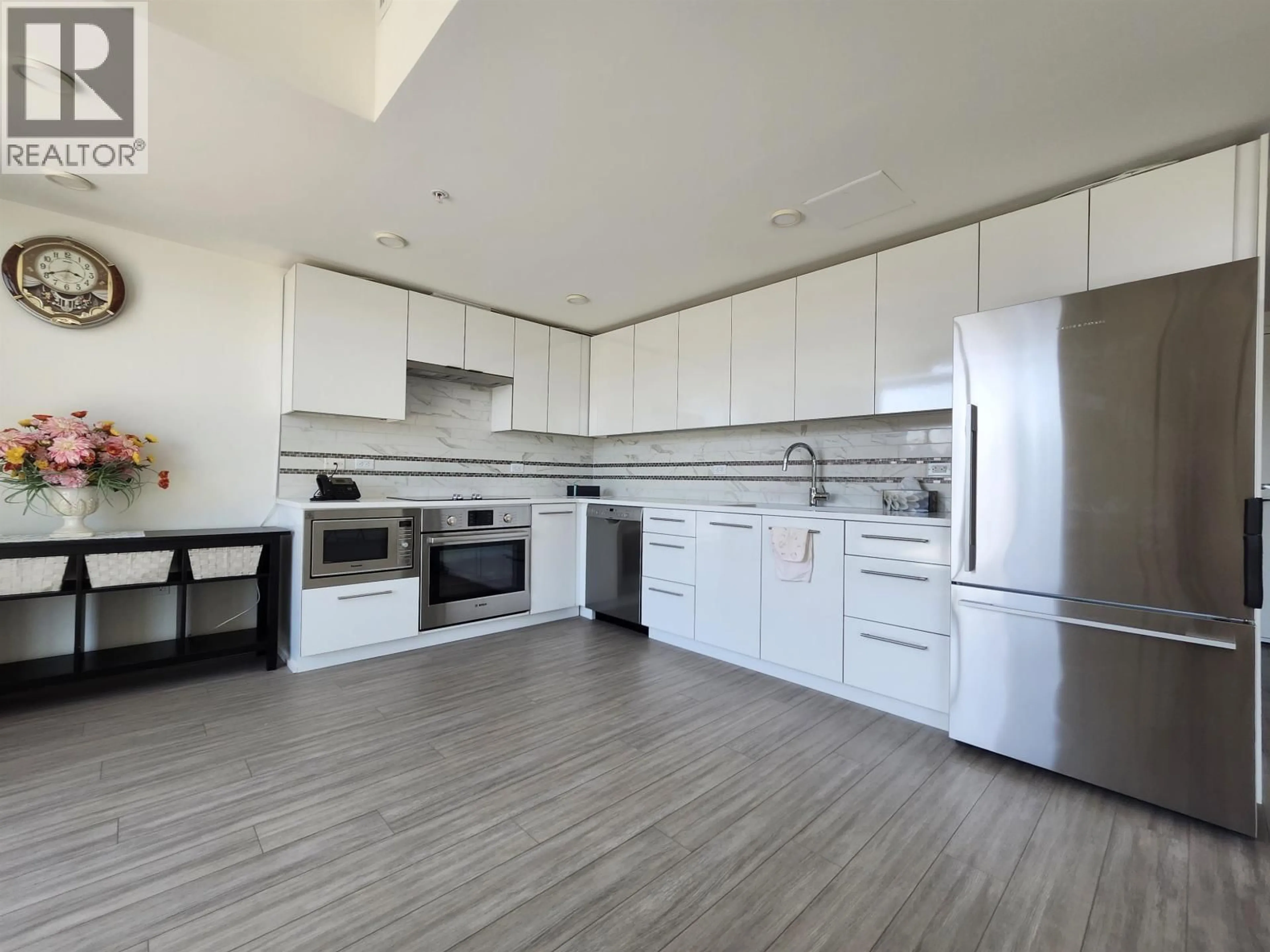 Open concept kitchen, unknown for 578 - 438 KING EDWARD AVENUE, Vancouver British Columbia V5Y0M5
