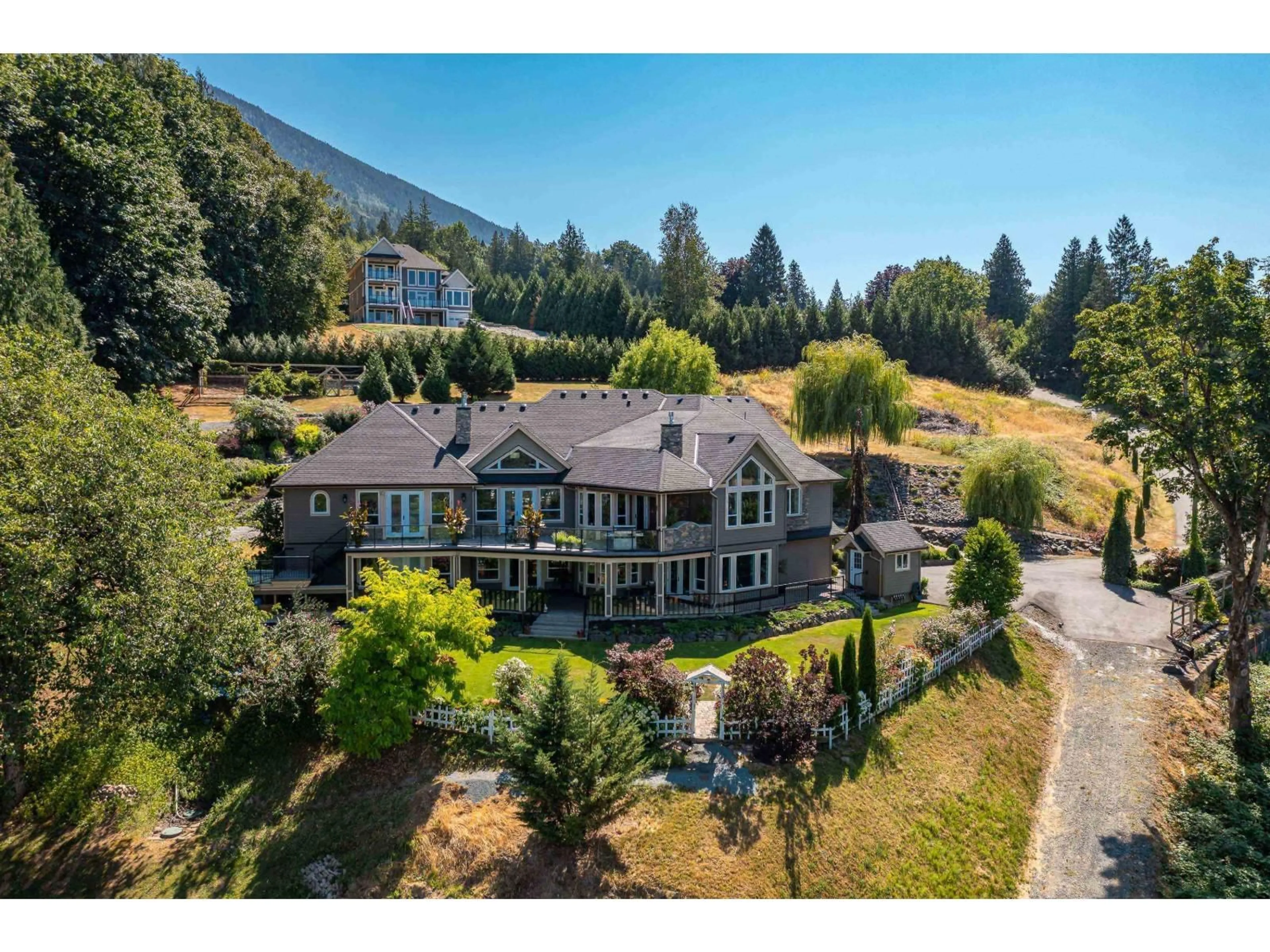 A pic from outside/outdoor area/front of a property/back of a property/a pic from drone, mountain view for 42395 HIGHLAND DRIVE, Yarrow British Columbia V2R5H2