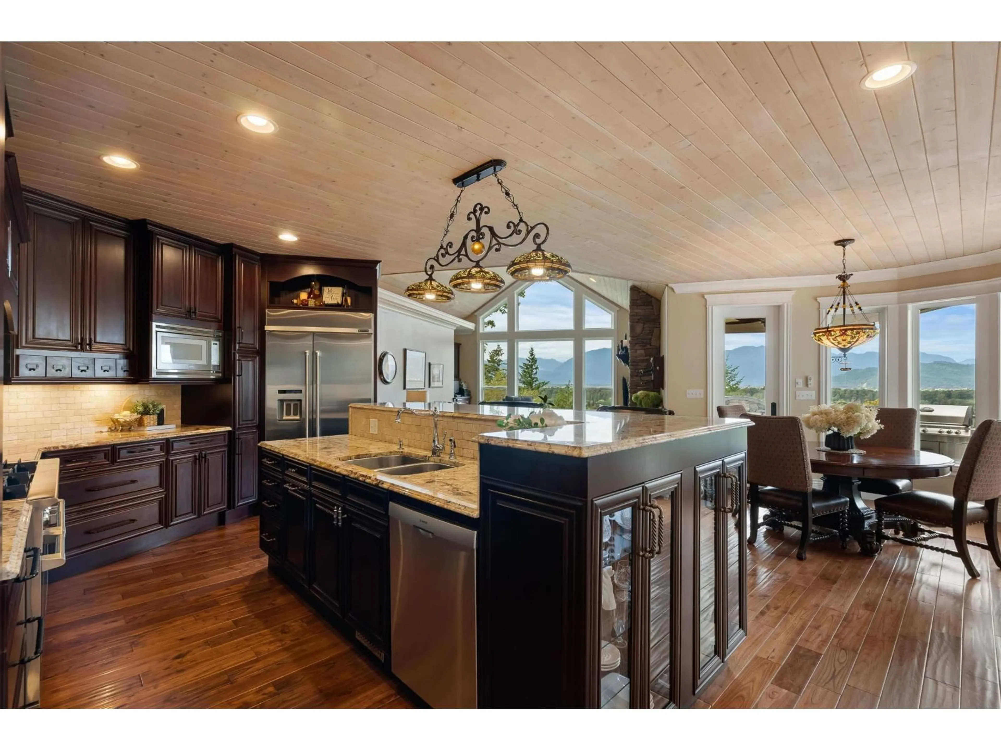 Open concept kitchen, wood/laminate floor for 42395 HIGHLAND DRIVE, Yarrow British Columbia V2R5H2