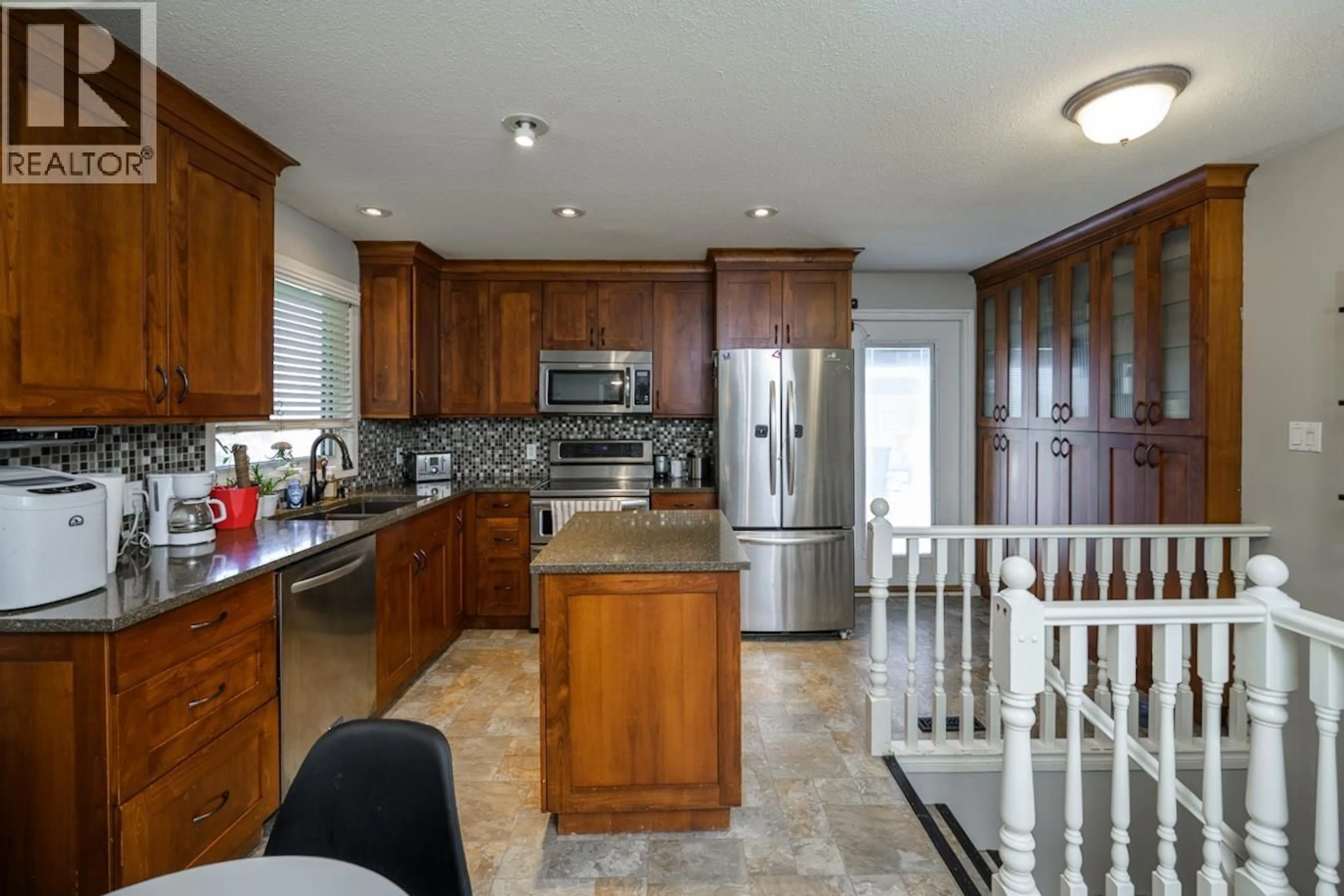 Open concept kitchen, ceramic/tile floor for 7238 BEAR ROAD, Prince George British Columbia V2N5N7