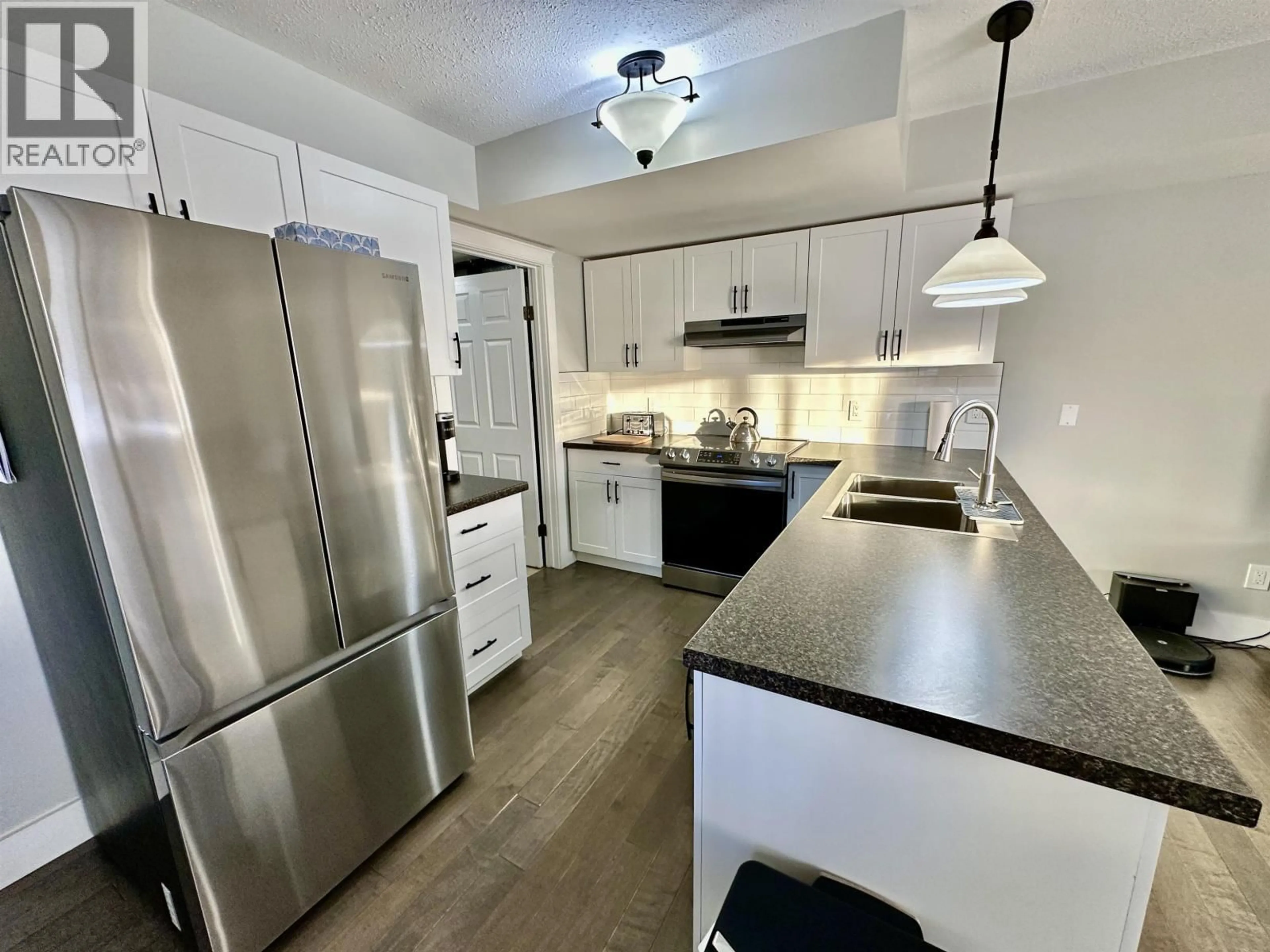 Open concept kitchen, unknown for B - 8923 102 AVENUE, Fort St. John British Columbia V1J5G4