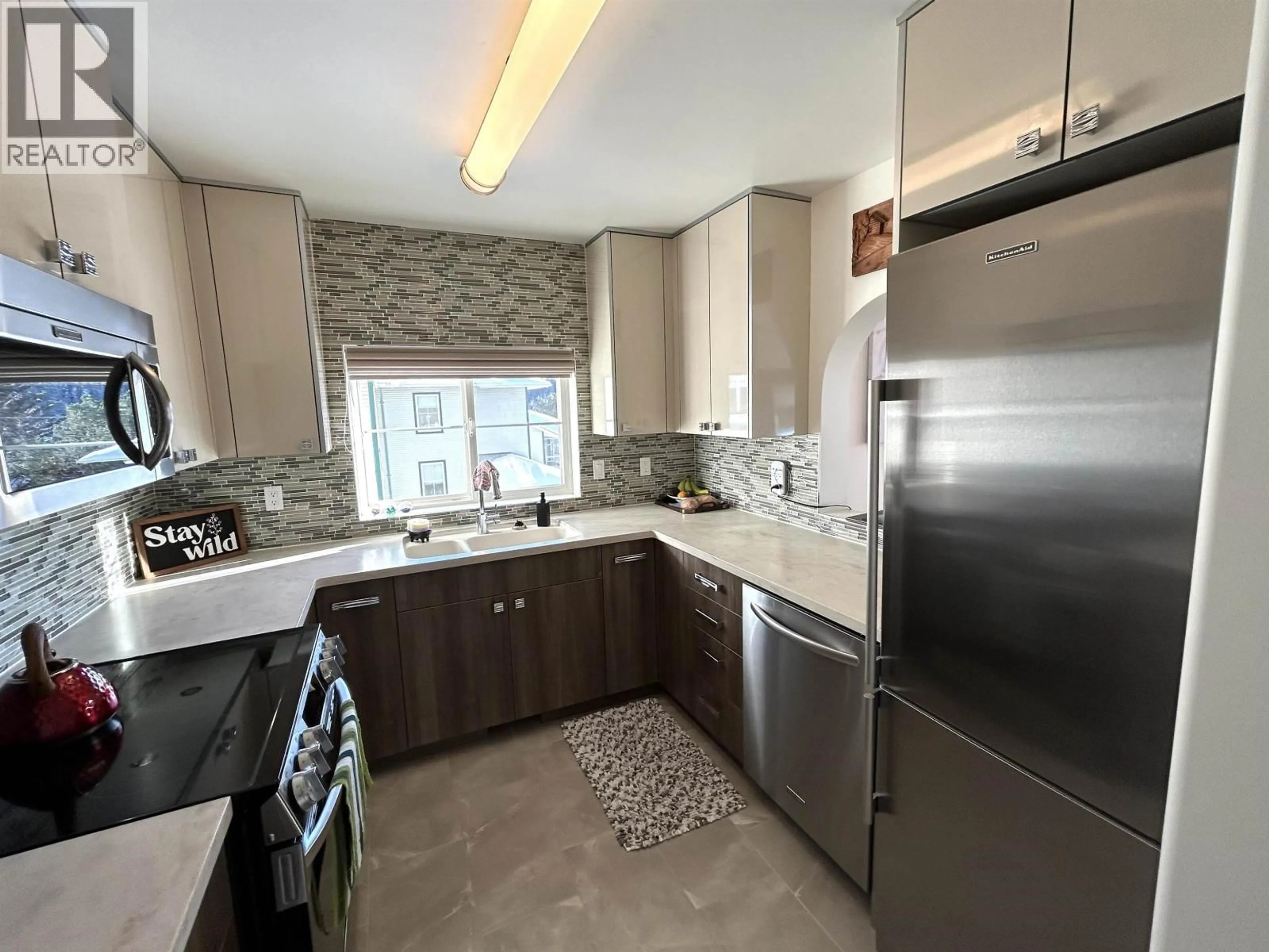 Open concept kitchen, ceramic/tile floor for 407 - 1638 6TH AVENUE, Prince George British Columbia V2L3N6