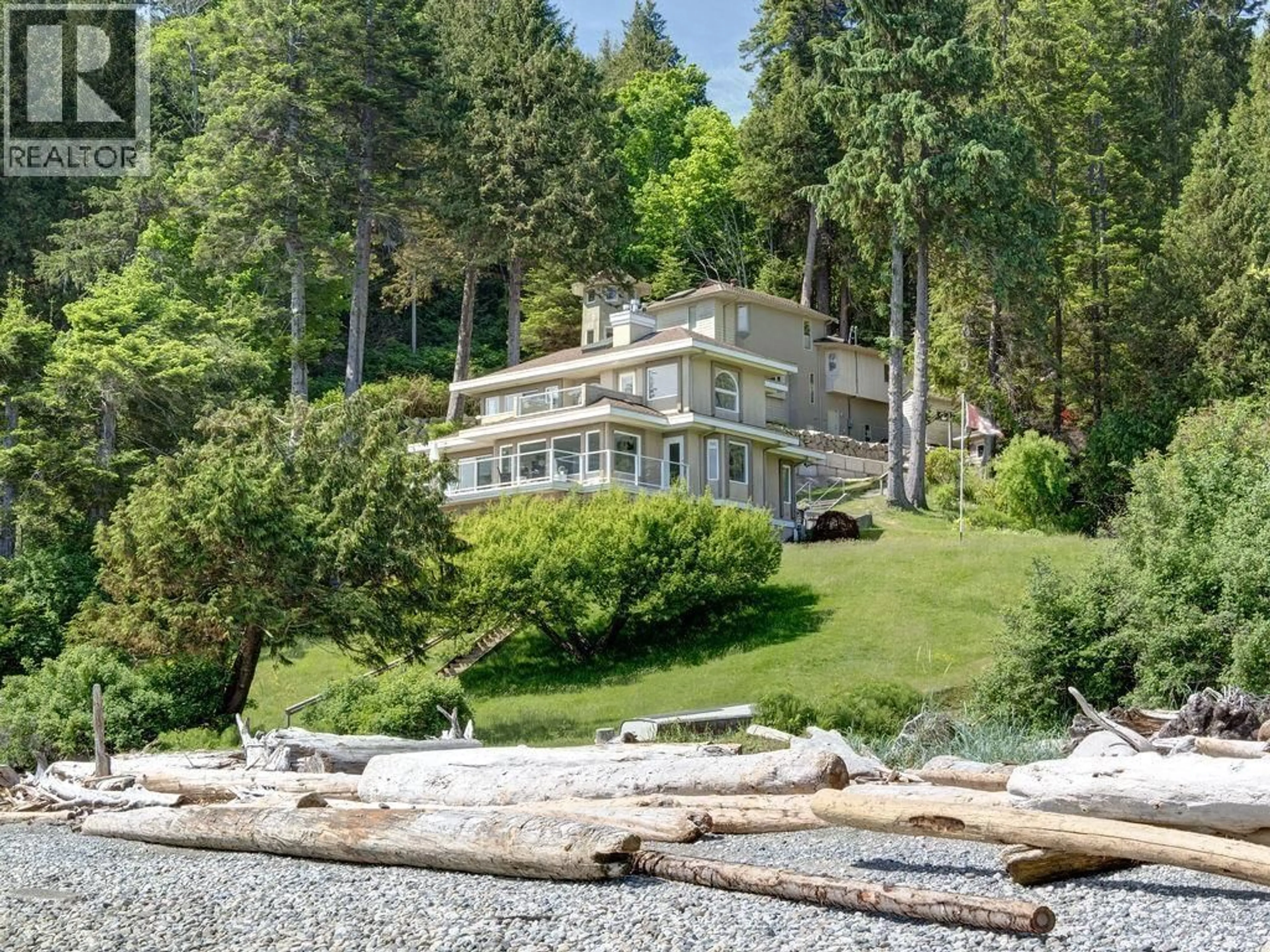 A pic from outside/outdoor area/front of a property/back of a property/a pic from drone, water/lake/river/ocean view for 7659 REDROOFFS ROAD, Halfmoon Bay British Columbia V7Z1C4