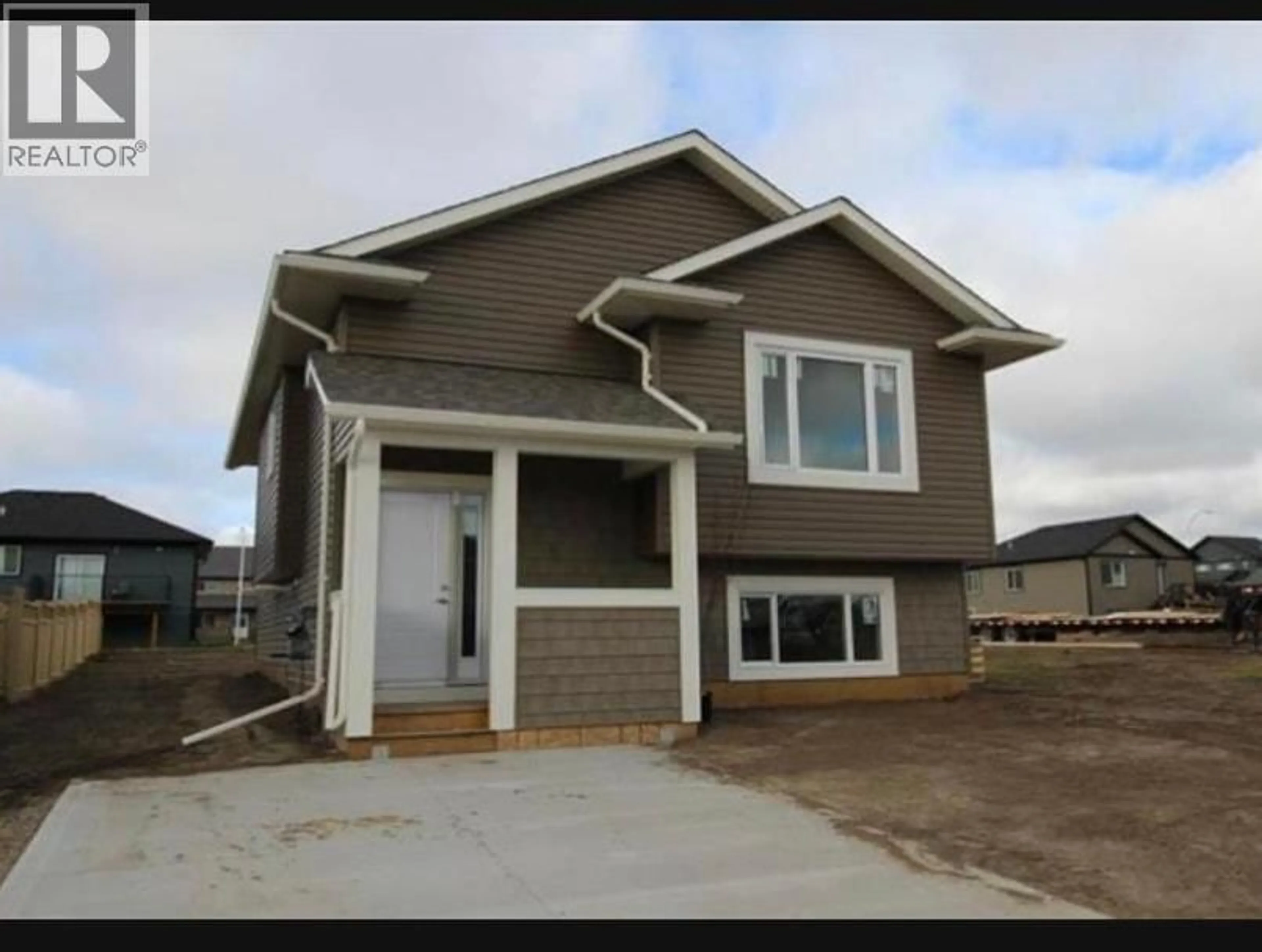 Home with vinyl exterior material, street for 8616 81A STREET, Fort St. John British Columbia V1J0B5