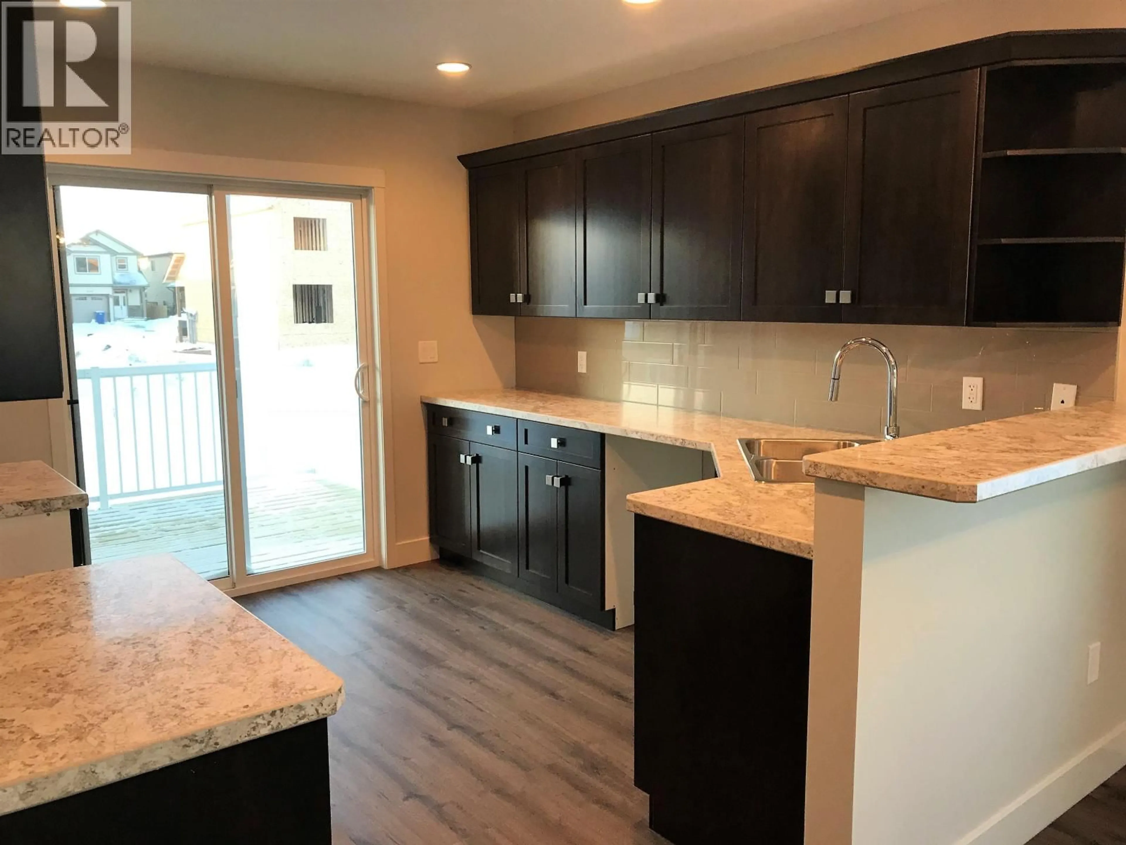 Open concept kitchen, unknown for 8616 81A STREET, Fort St. John British Columbia V1J0B5