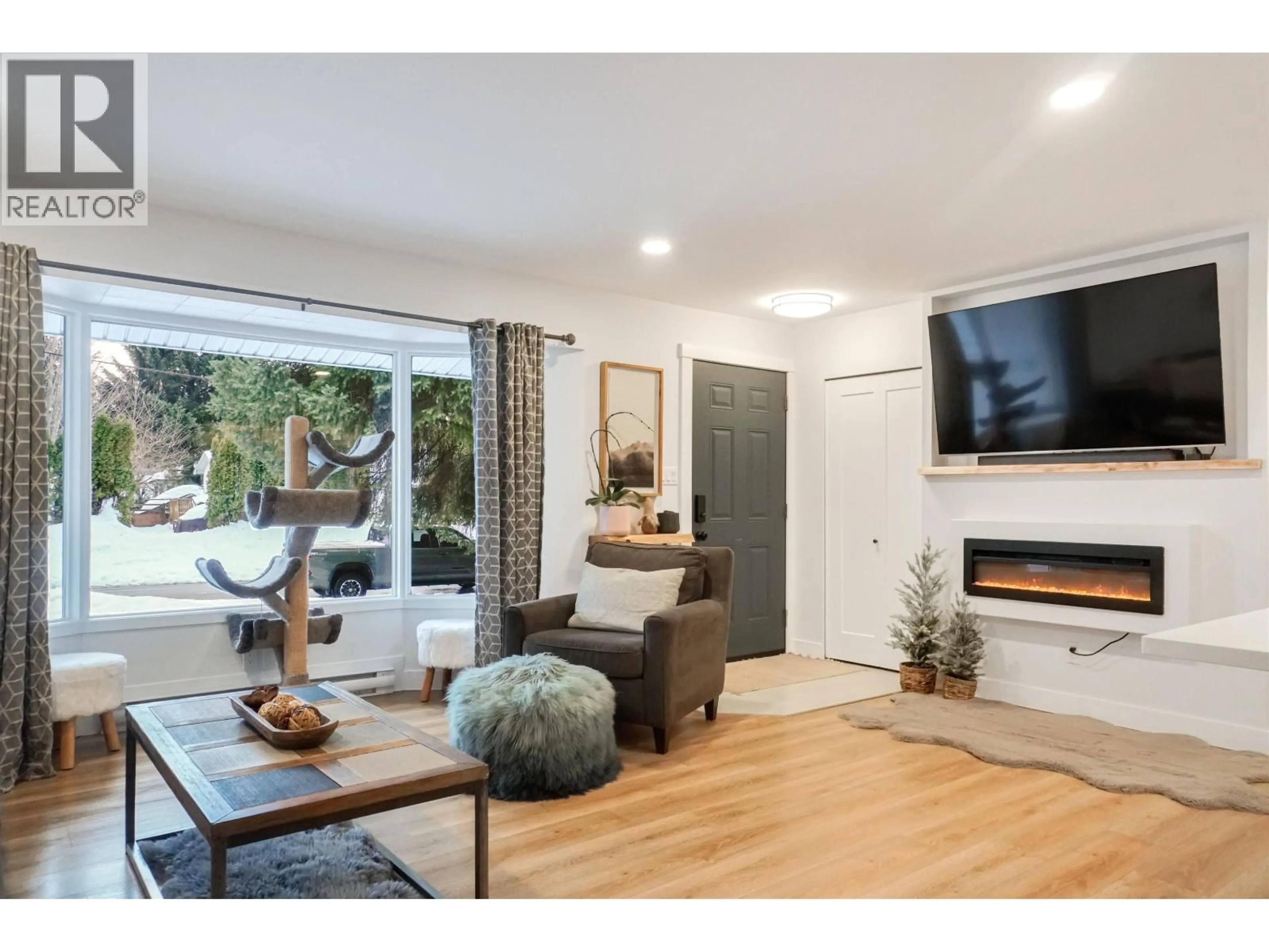 Living room with furniture, wood/laminate floor for 11 NADINA STREET, Kitimat British Columbia V8C2A3