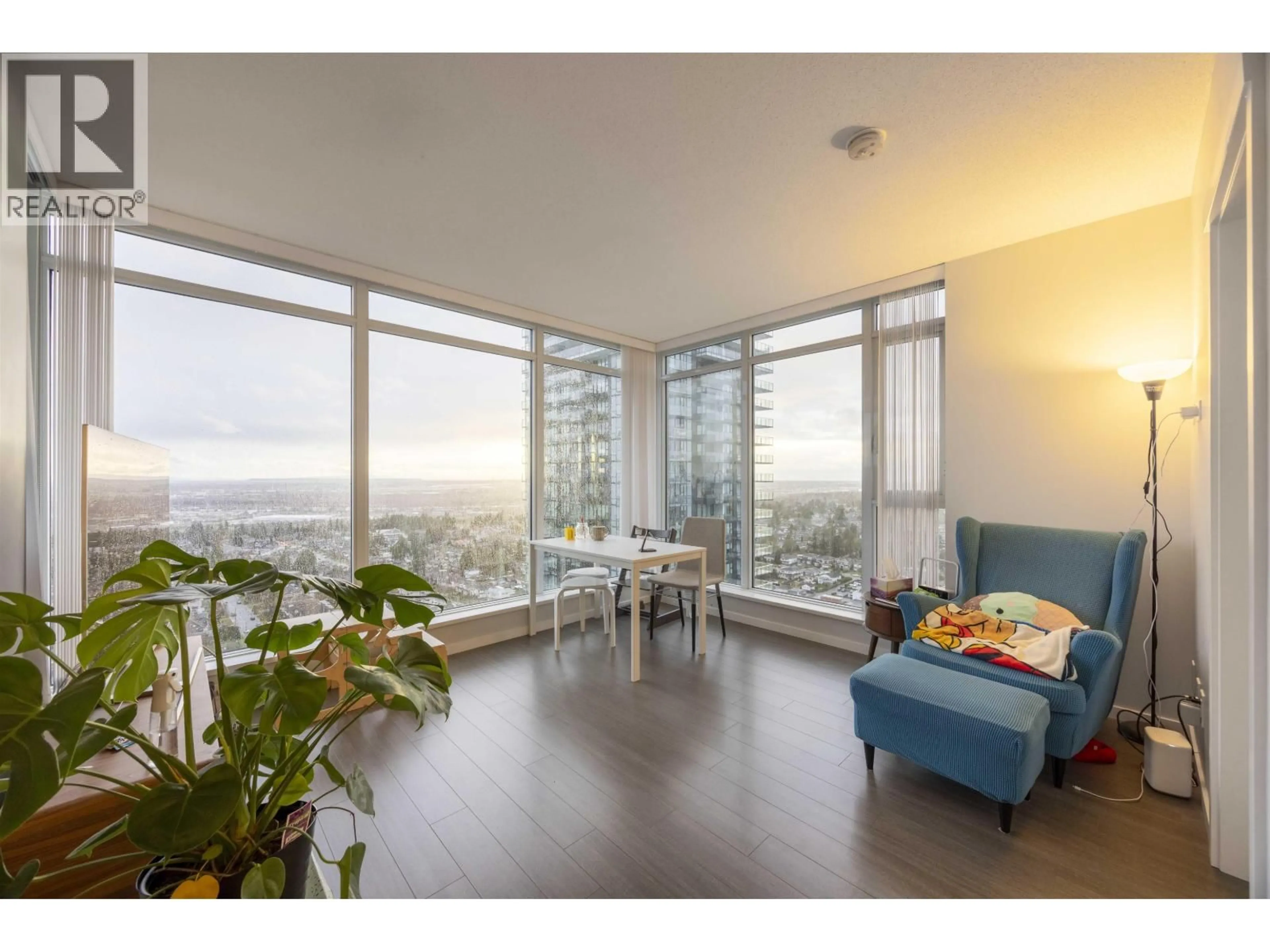 Living room with furniture, wood/laminate floor for 2801 - 6700 DUNBLANE AVENUE, Burnaby British Columbia V5H0J3