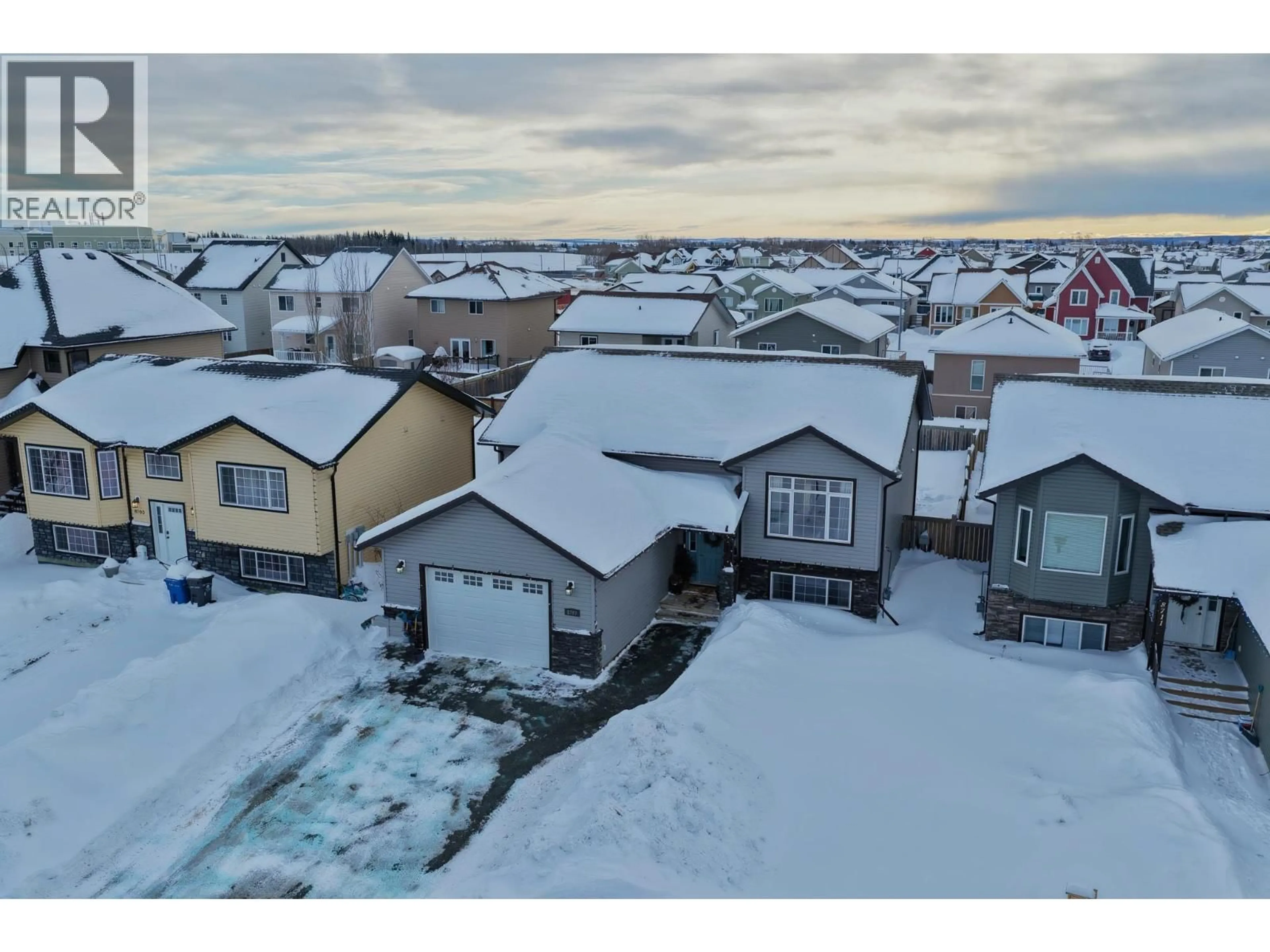 A pic from outside/outdoor area/front of a property/back of a property/a pic from drone, street for 8707 113A AVENUE, Fort St. John British Columbia V1J0C4