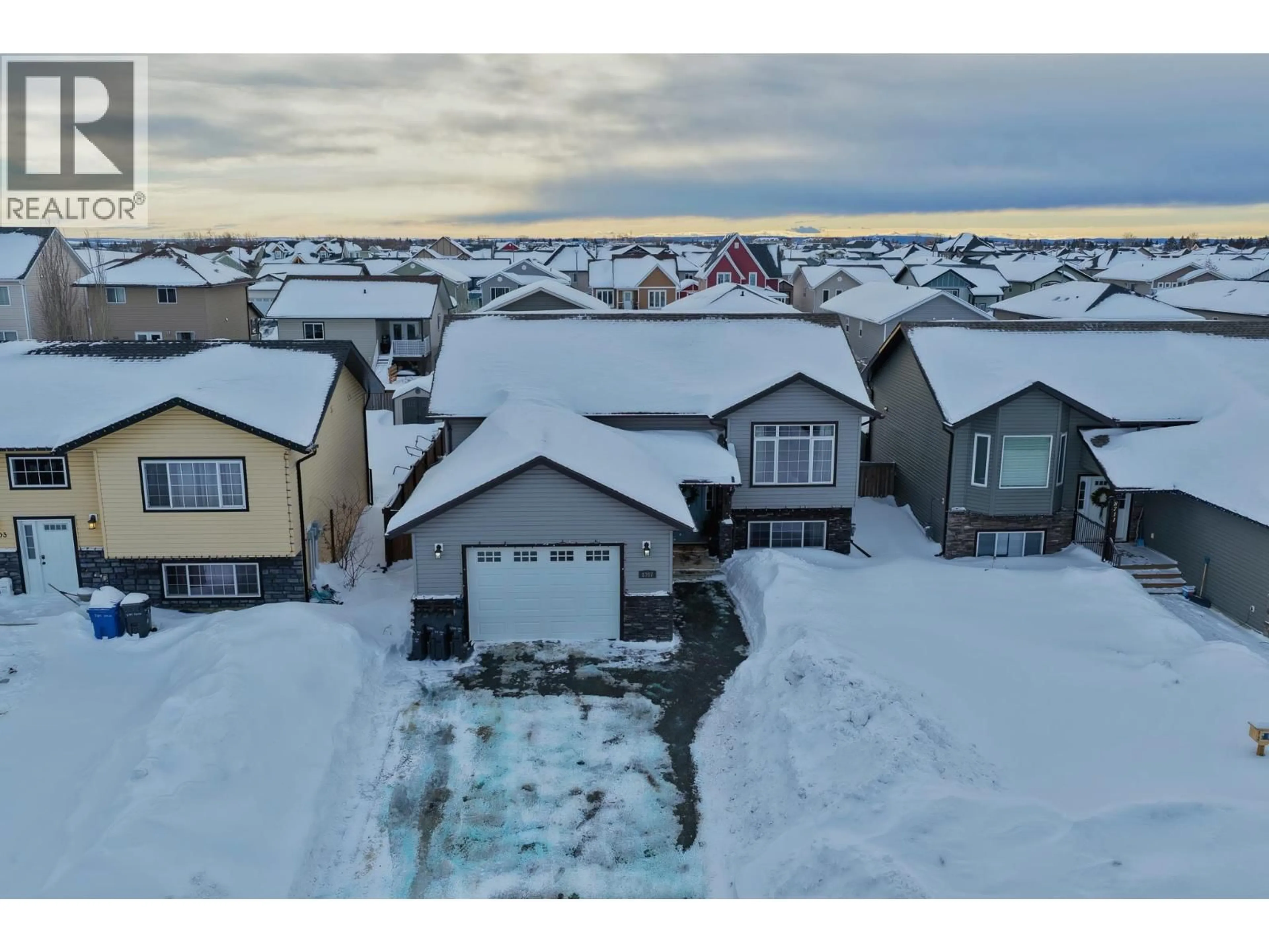 A pic from outside/outdoor area/front of a property/back of a property/a pic from drone, street for 8707 113A AVENUE, Fort St. John British Columbia V1J0C4