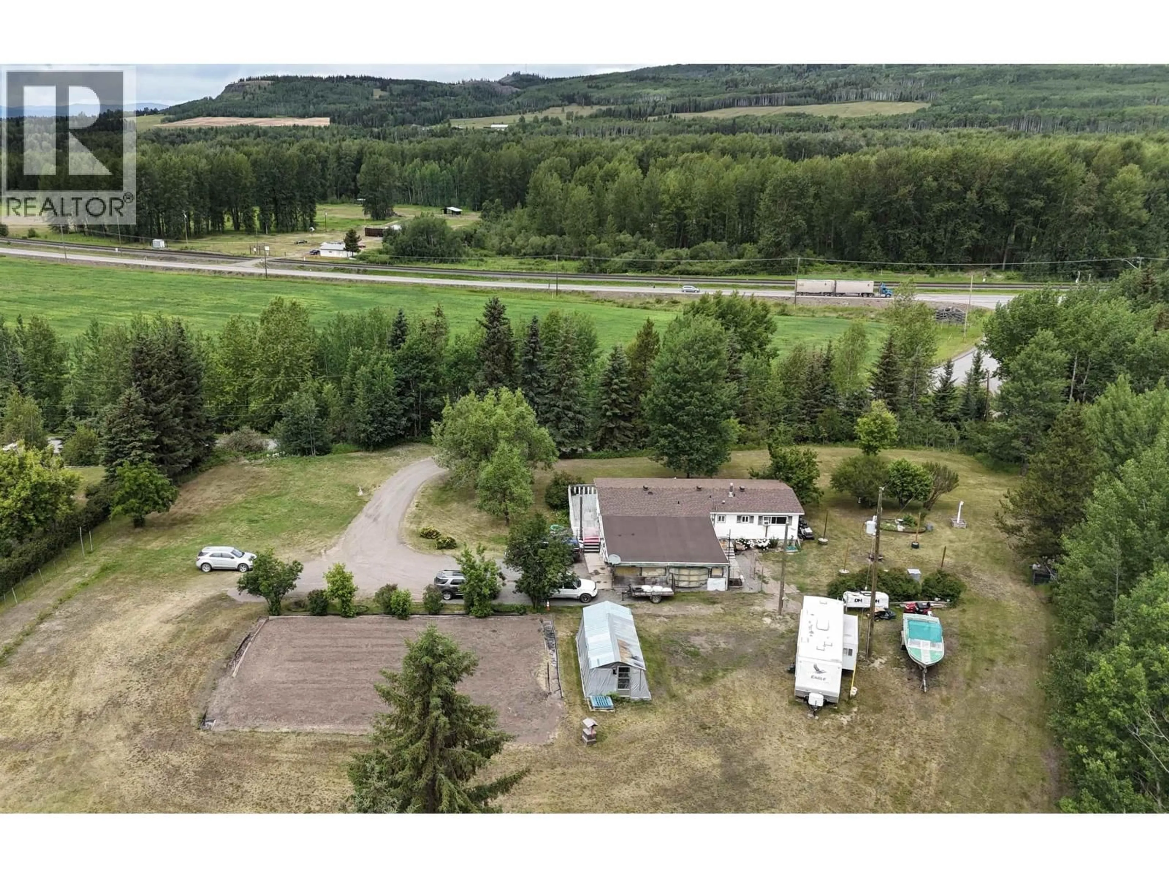 A pic from outside/outdoor area/front of a property/back of a property/a pic from drone, mountain view for 1790 BUCK FLATS ROAD, Houston British Columbia V0J1Z1