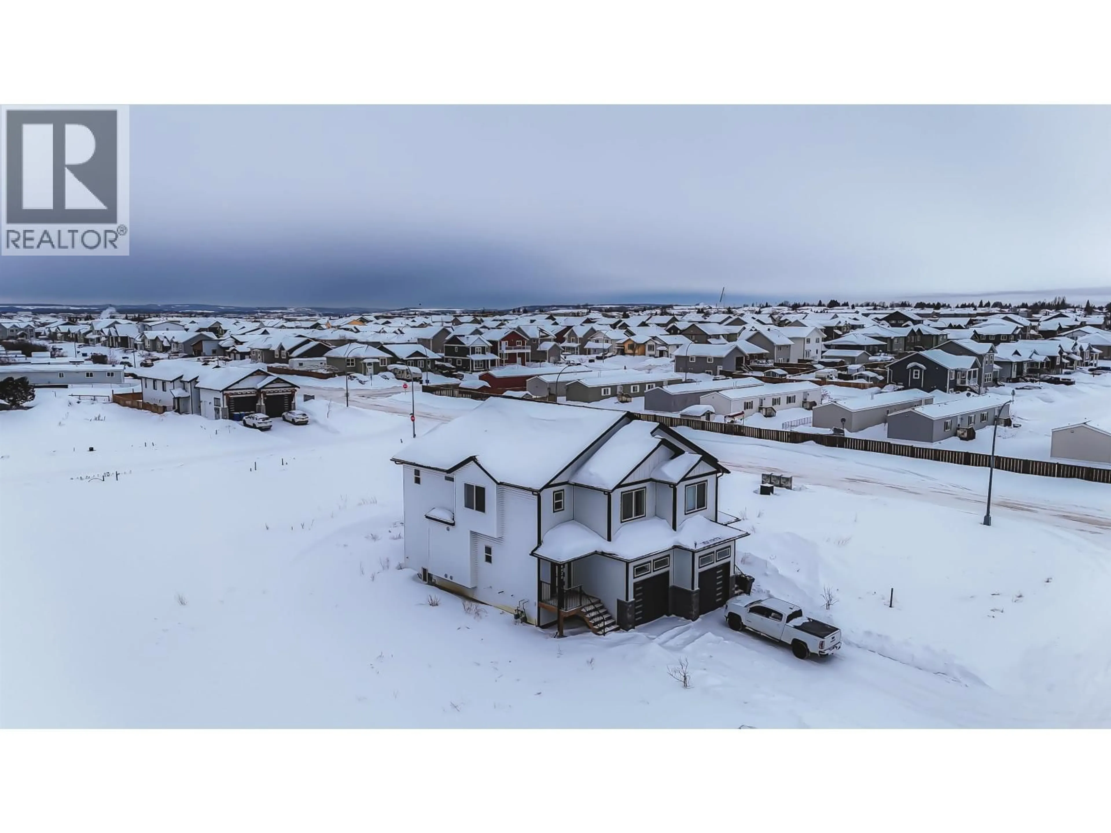 A pic from outside/outdoor area/front of a property/back of a property/a pic from drone, street for 8424 81A STREET, Fort St. John British Columbia V1J0P9