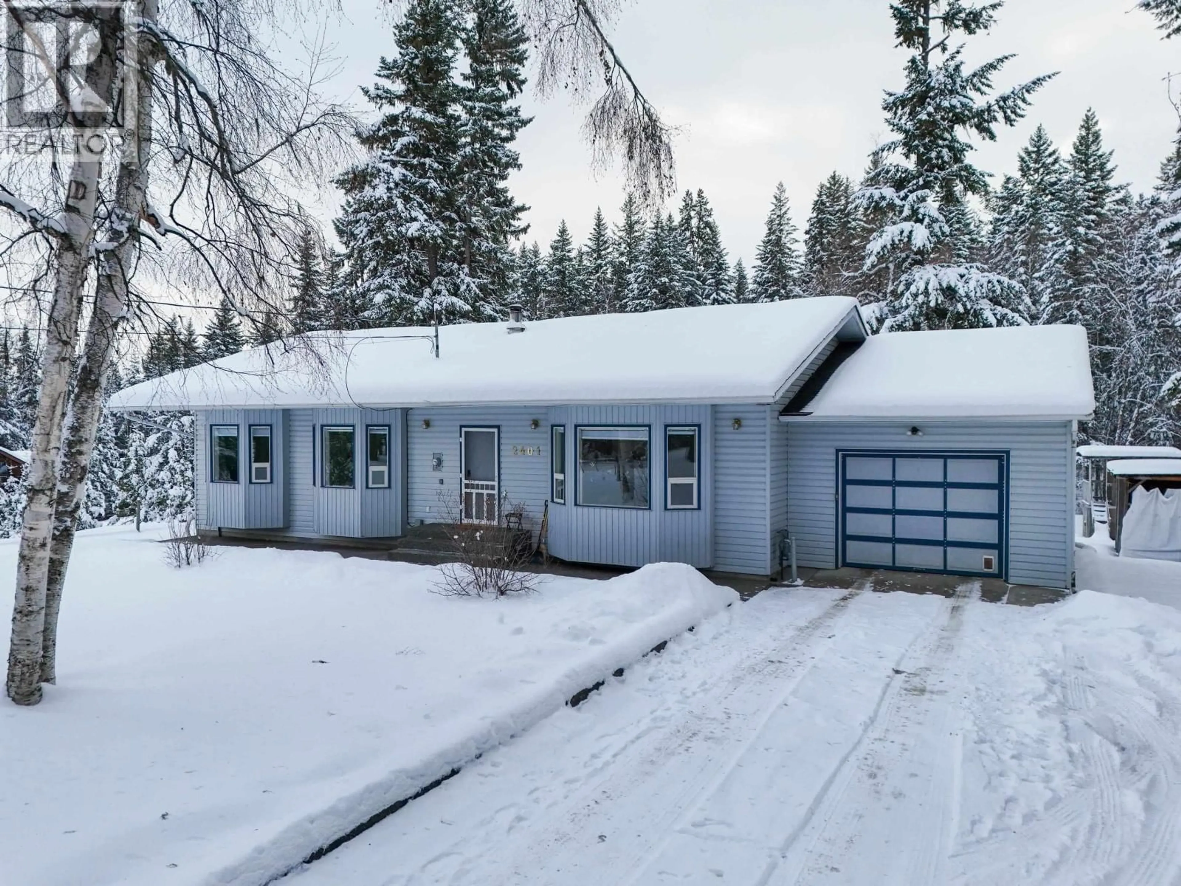 Home with vinyl exterior material, street for 2401 TANOKA ROAD, Quesnel British Columbia V2J7B8