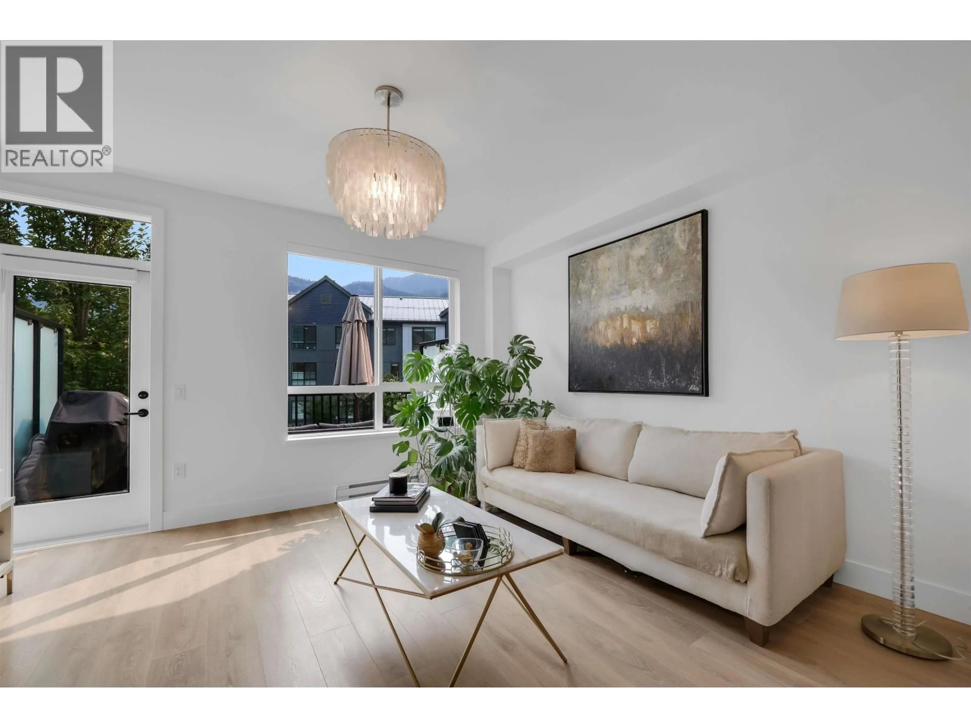 Living room with furniture, unknown for 38053 HELM WAY, Squamish British Columbia V8B2A1