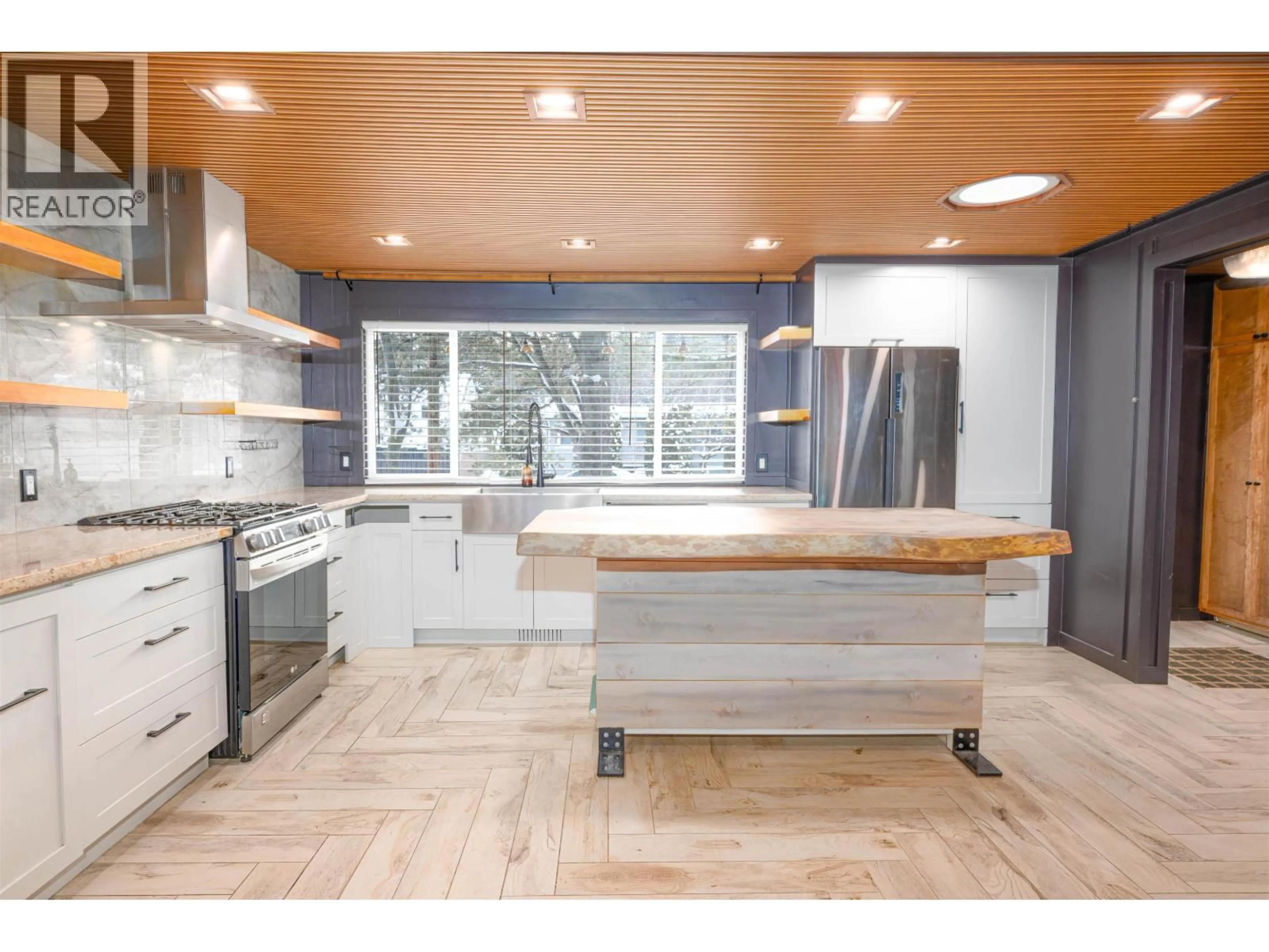 Open concept kitchen, wood/laminate floor for 2728 VANCE ROAD, Prince George British Columbia V2N1N6