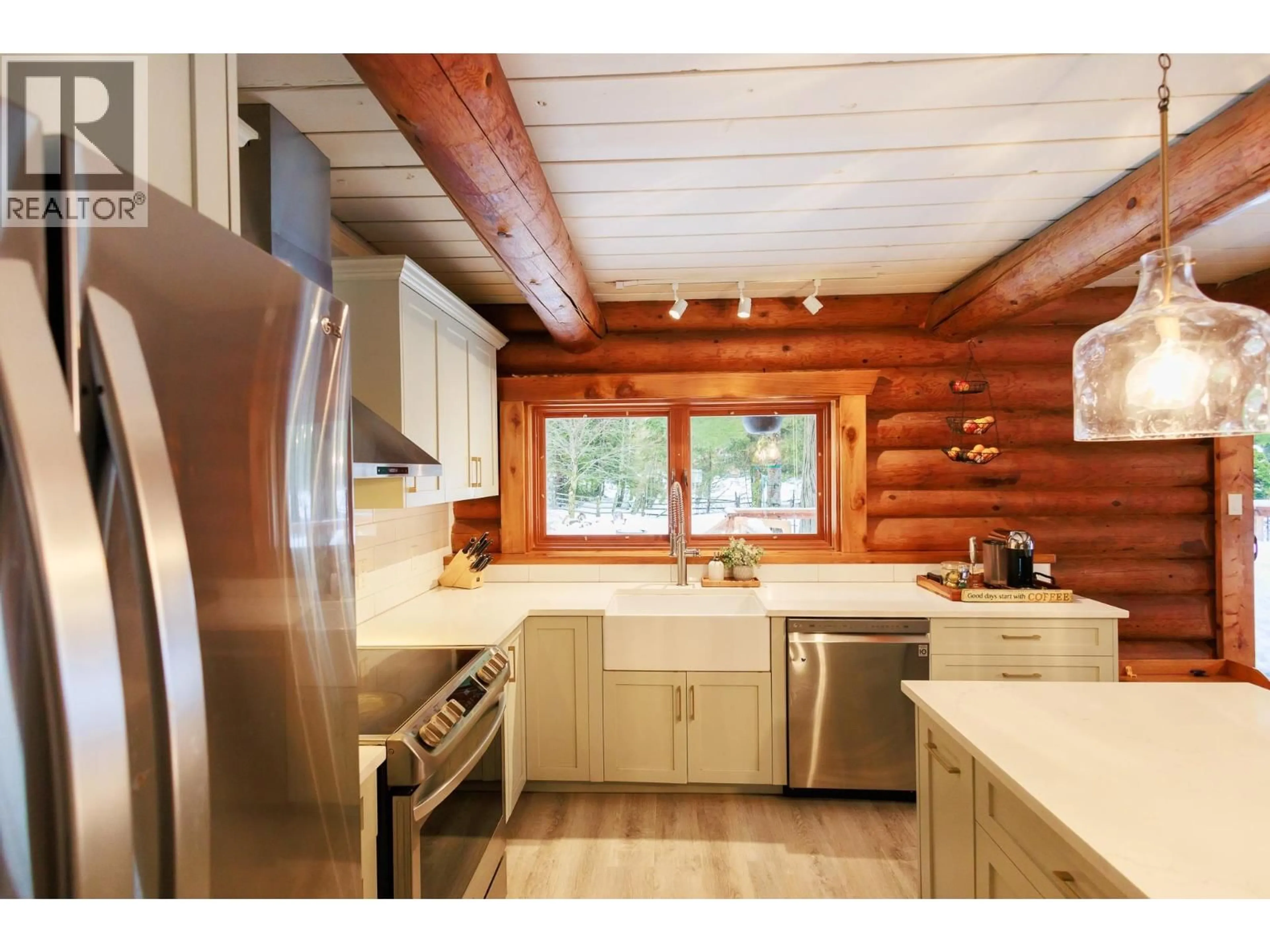 Rustic kitchen, wood/laminate floor for 4550 COPPER RIVER ROAD, Terrace British Columbia V8G0A5