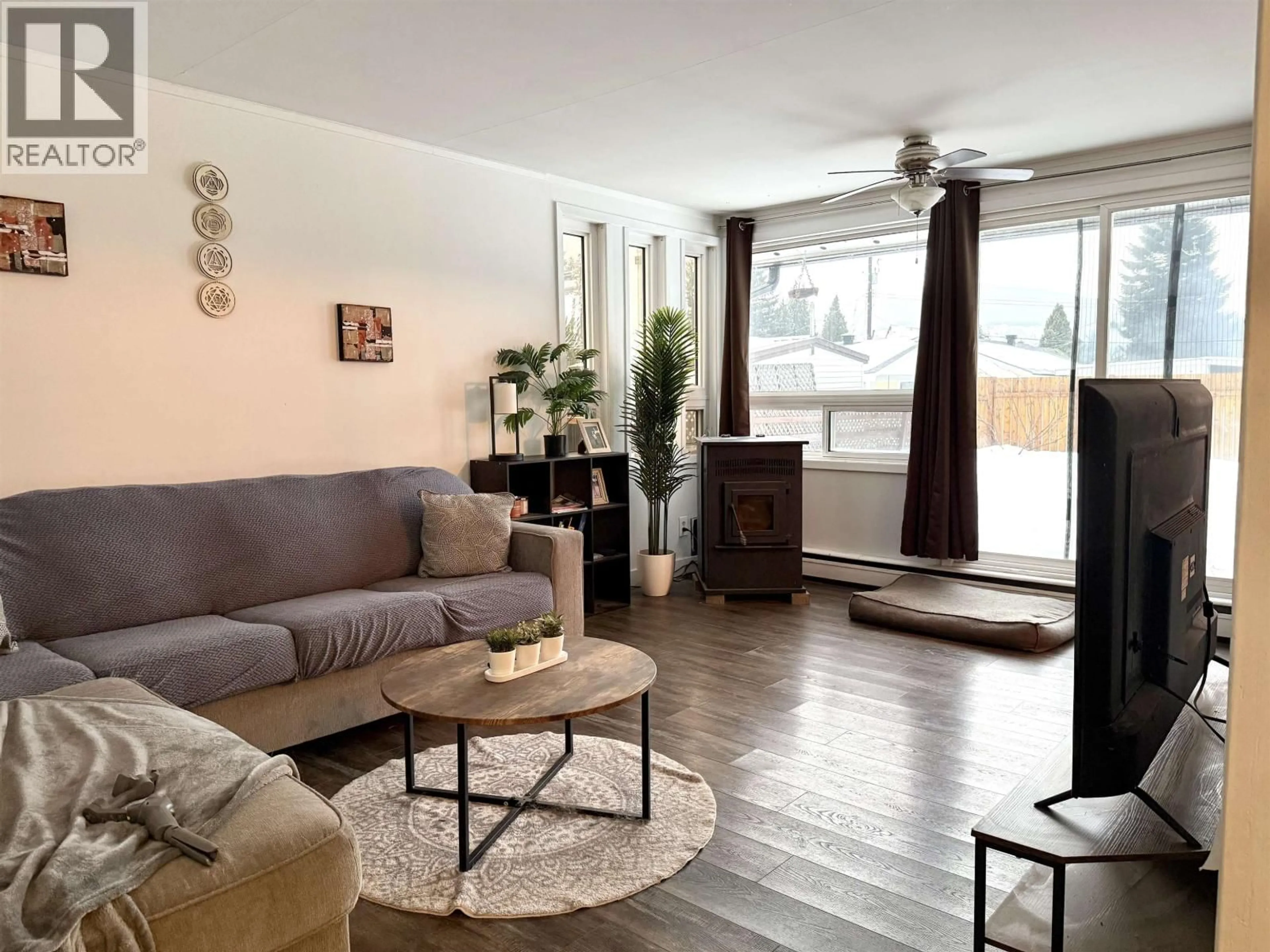 Living room with furniture, wood/laminate floor for 29 SAGUENAY STREET, Kitimat British Columbia V8C1W7