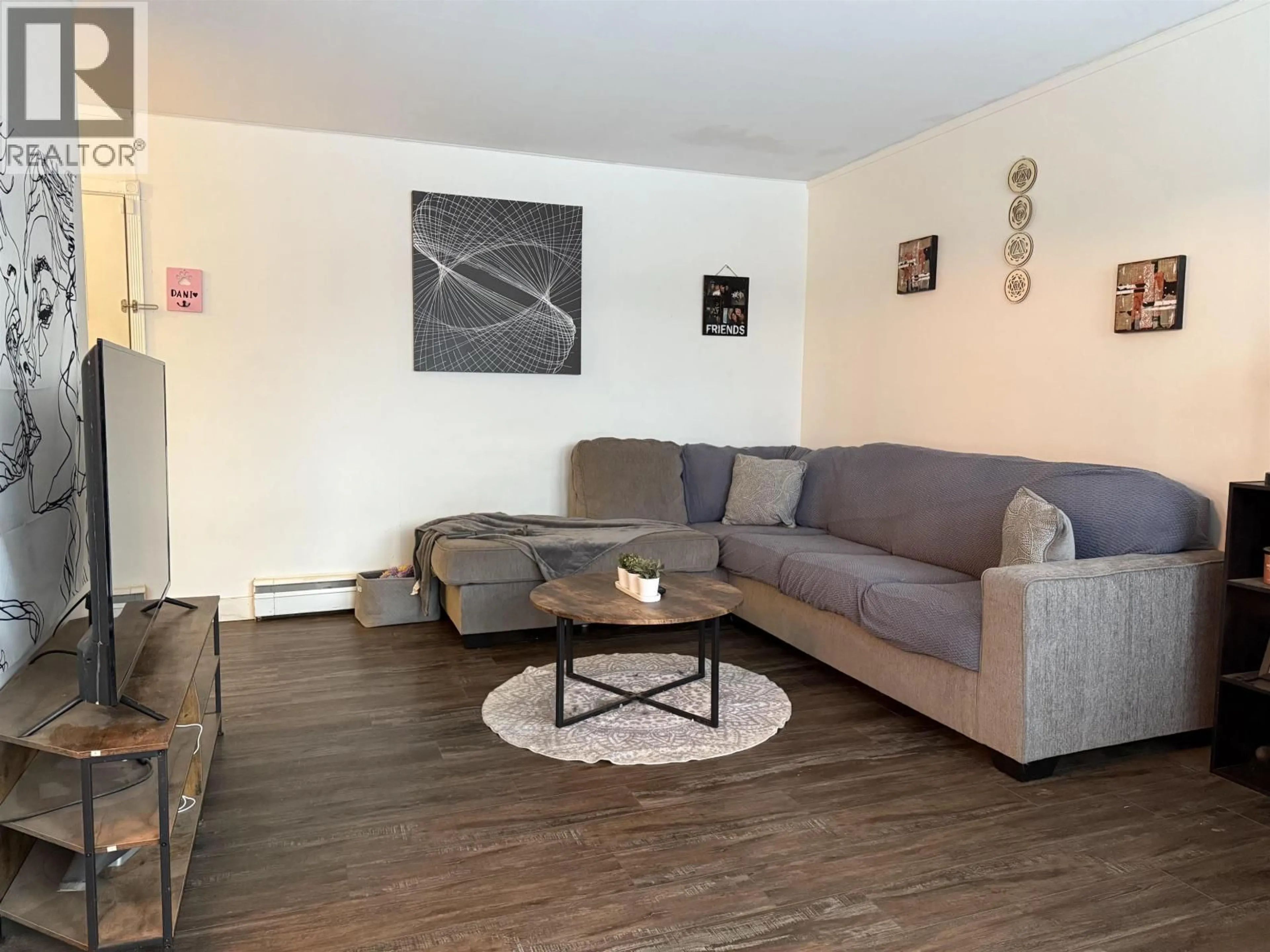 Living room with furniture, wood/laminate floor for 29 SAGUENAY STREET, Kitimat British Columbia V8C1W7