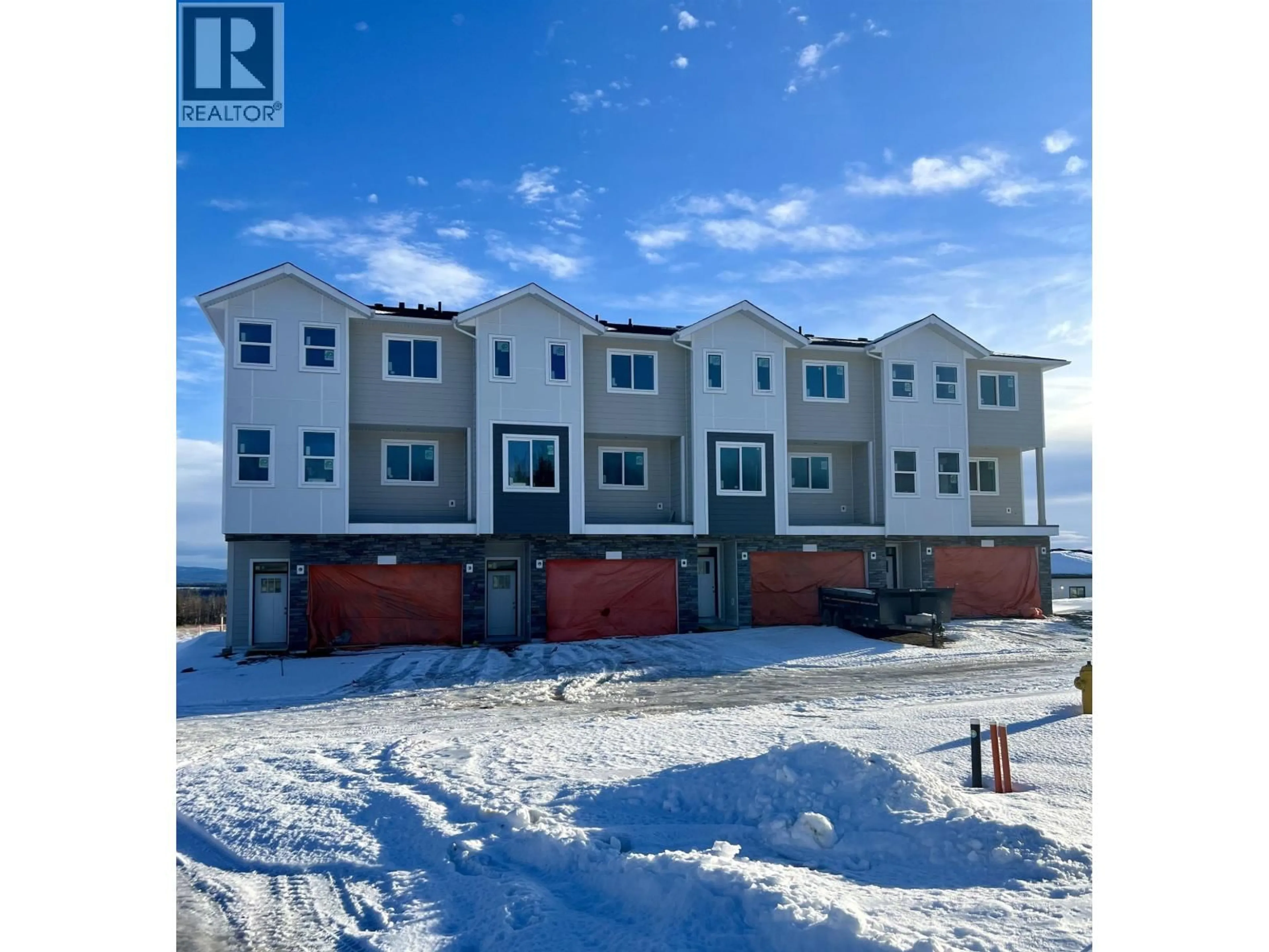 A pic from outside/outdoor area/front of a property/back of a property/a pic from drone, unknown for 1802 - 7785 SOUTHRIDGE AVENUE, Prince George British Columbia V2N6S4