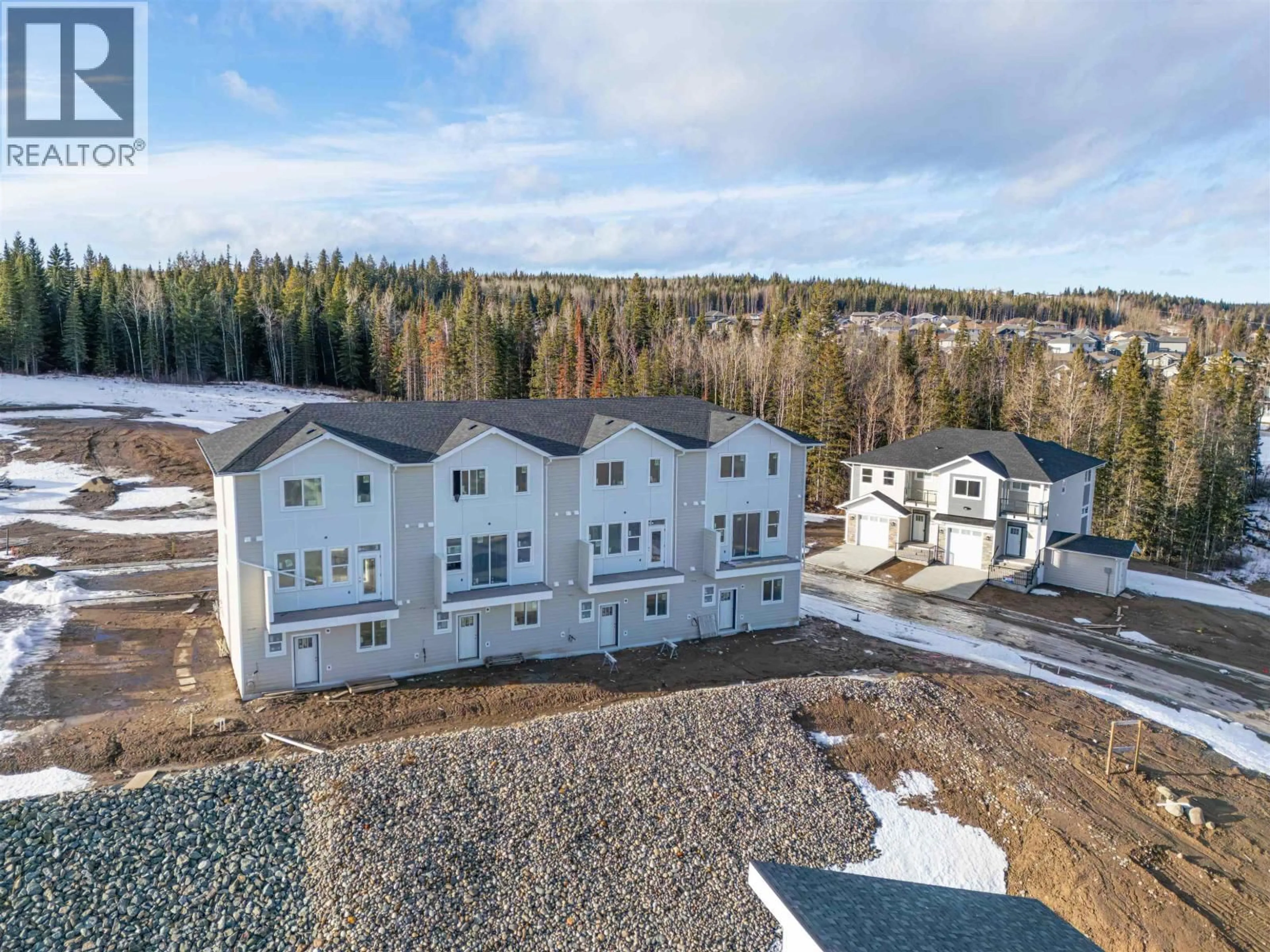 A pic from outside/outdoor area/front of a property/back of a property/a pic from drone, unknown for 1803 - 7785 SOUTHRIDGE AVENUE, Prince George British Columbia V2N6S4