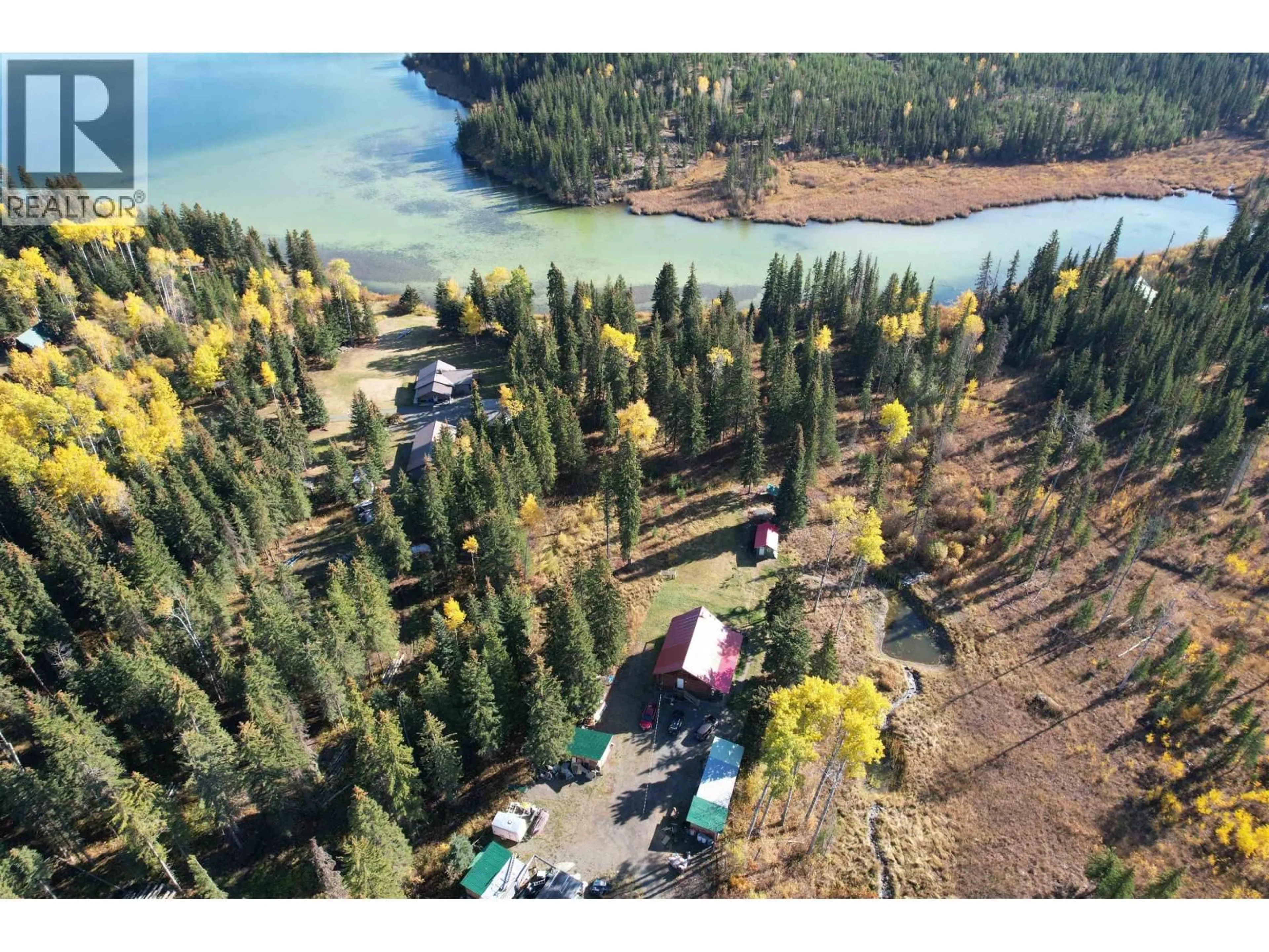 A pic from outside/outdoor area/front of a property/back of a property/a pic from drone, water/lake/river/ocean view for 7742 BRIDGE LAKE ROAD, Bridge Lake British Columbia V0K1X2