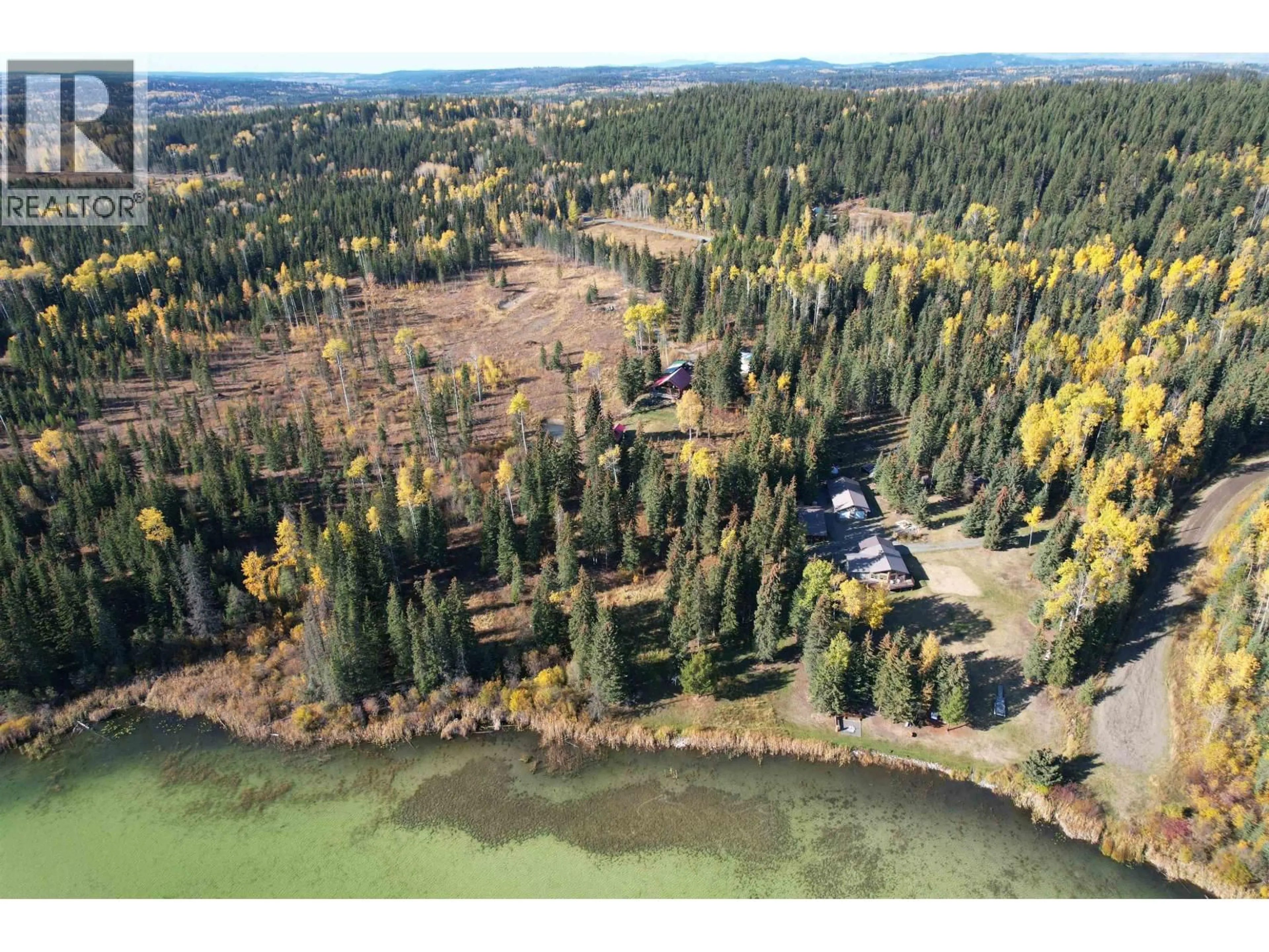 A pic from outside/outdoor area/front of a property/back of a property/a pic from drone, forest/trees view for 7742 BRIDGE LAKE ROAD, Bridge Lake British Columbia V0K1X2