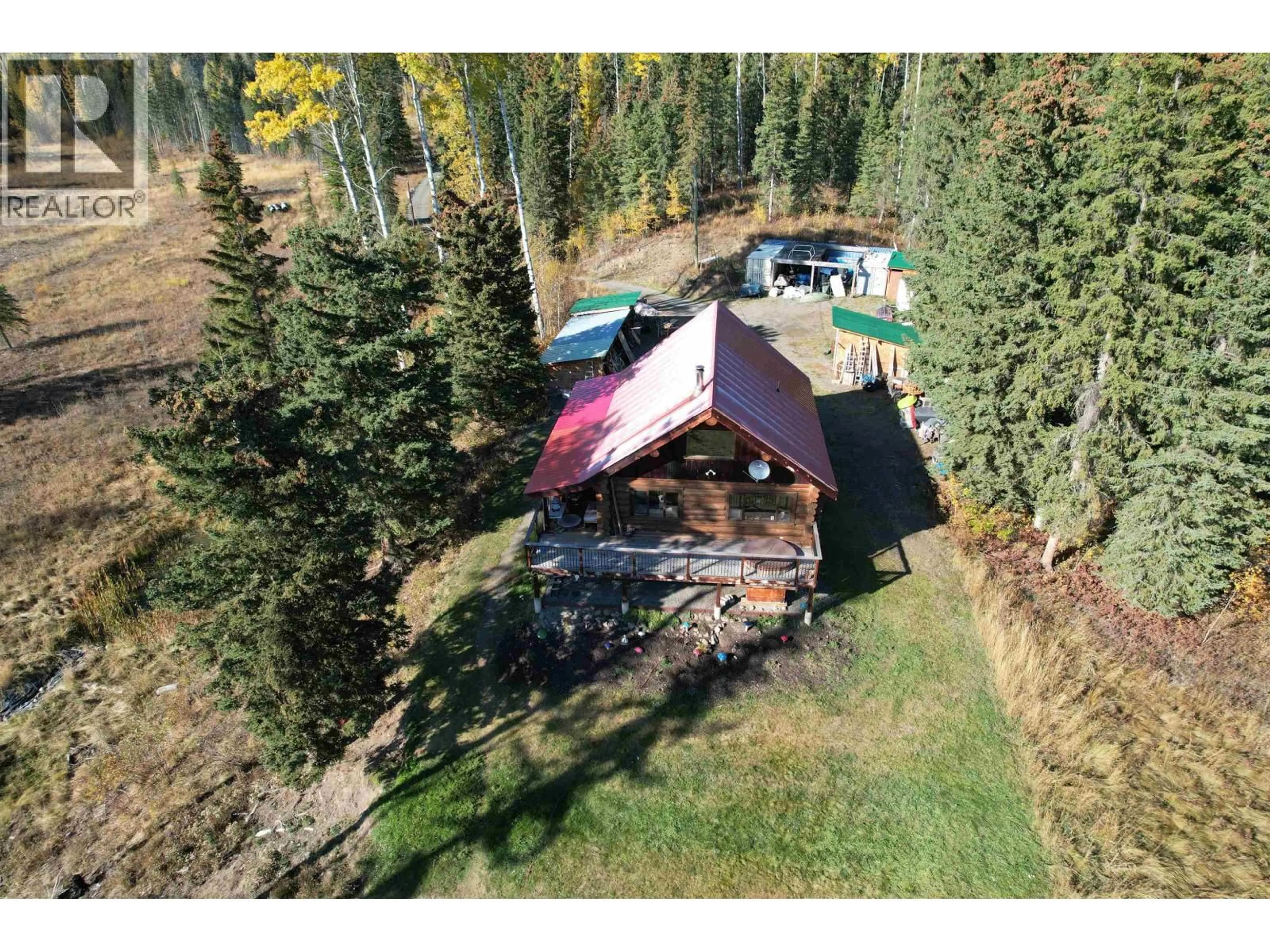 A pic from outside/outdoor area/front of a property/back of a property/a pic from drone, forest/trees view for 7742 BRIDGE LAKE ROAD, Bridge Lake British Columbia V0K1X2