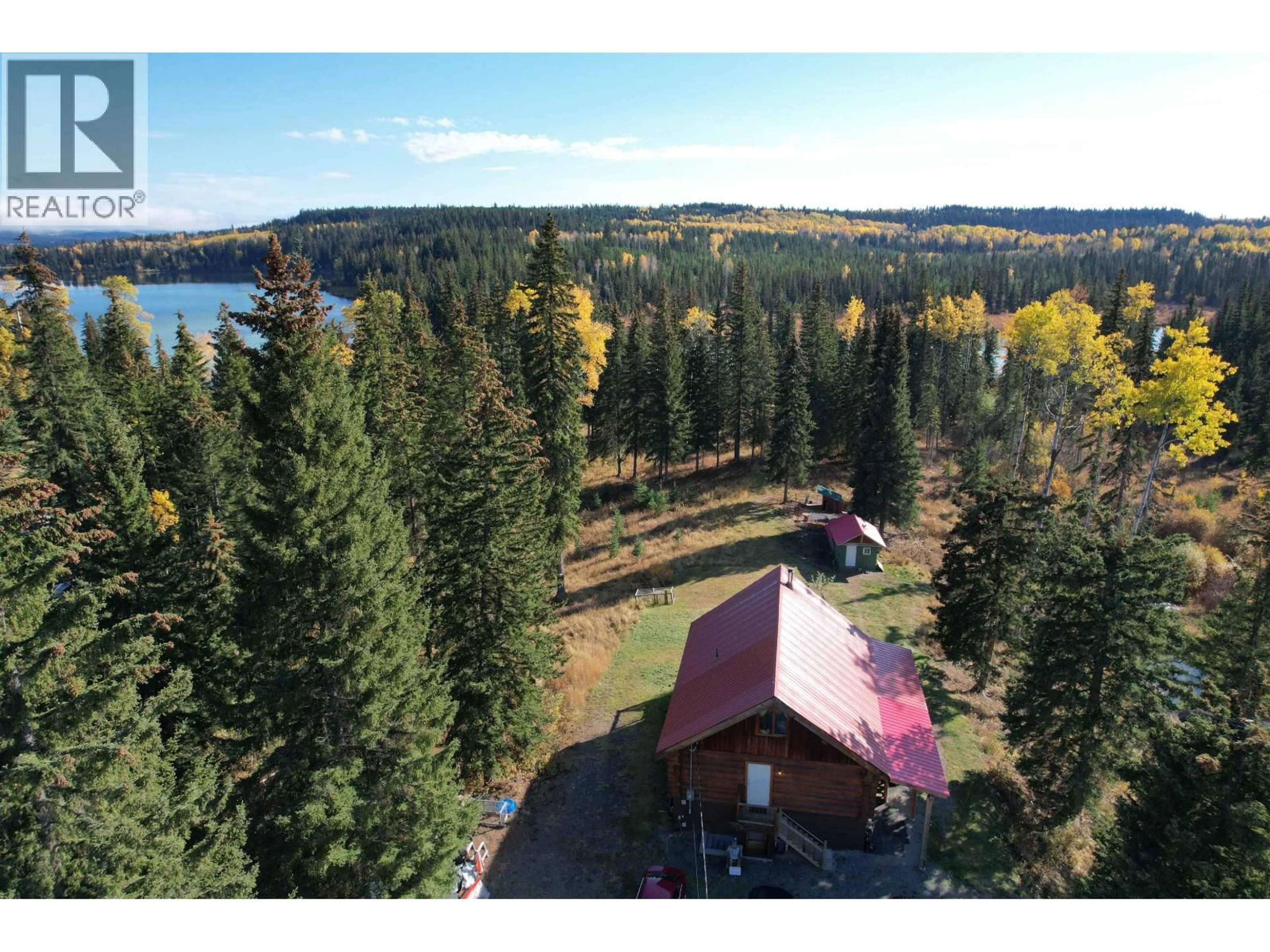 A pic from outside/outdoor area/front of a property/back of a property/a pic from drone, water/lake/river/ocean view for 7742 BRIDGE LAKE ROAD, Bridge Lake British Columbia V0K1X2