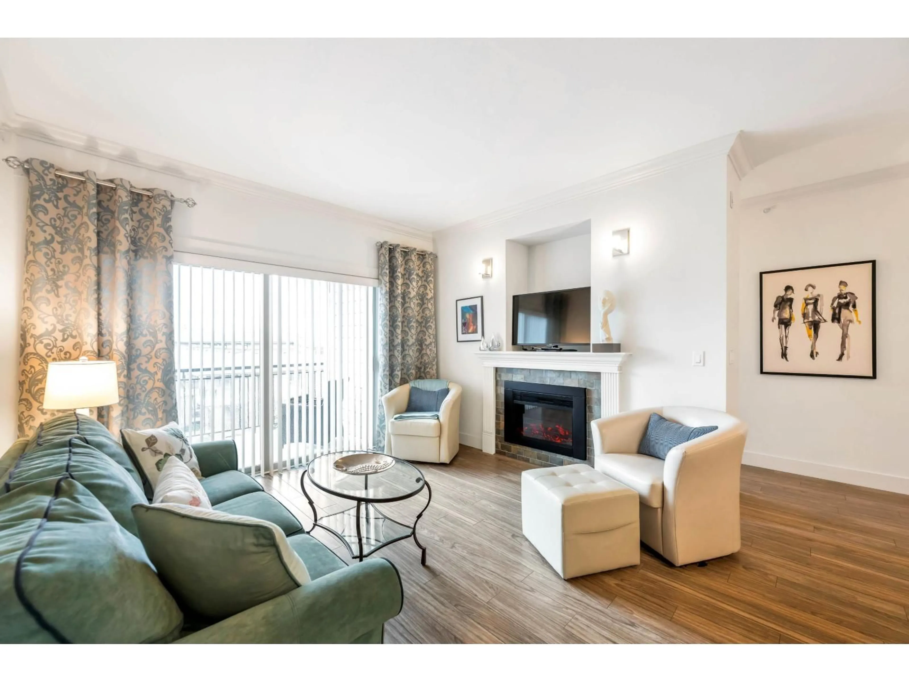 Living room with furniture, wood/laminate floor for 406 - 15368 17A AVENUE, Surrey British Columbia V4A1V3