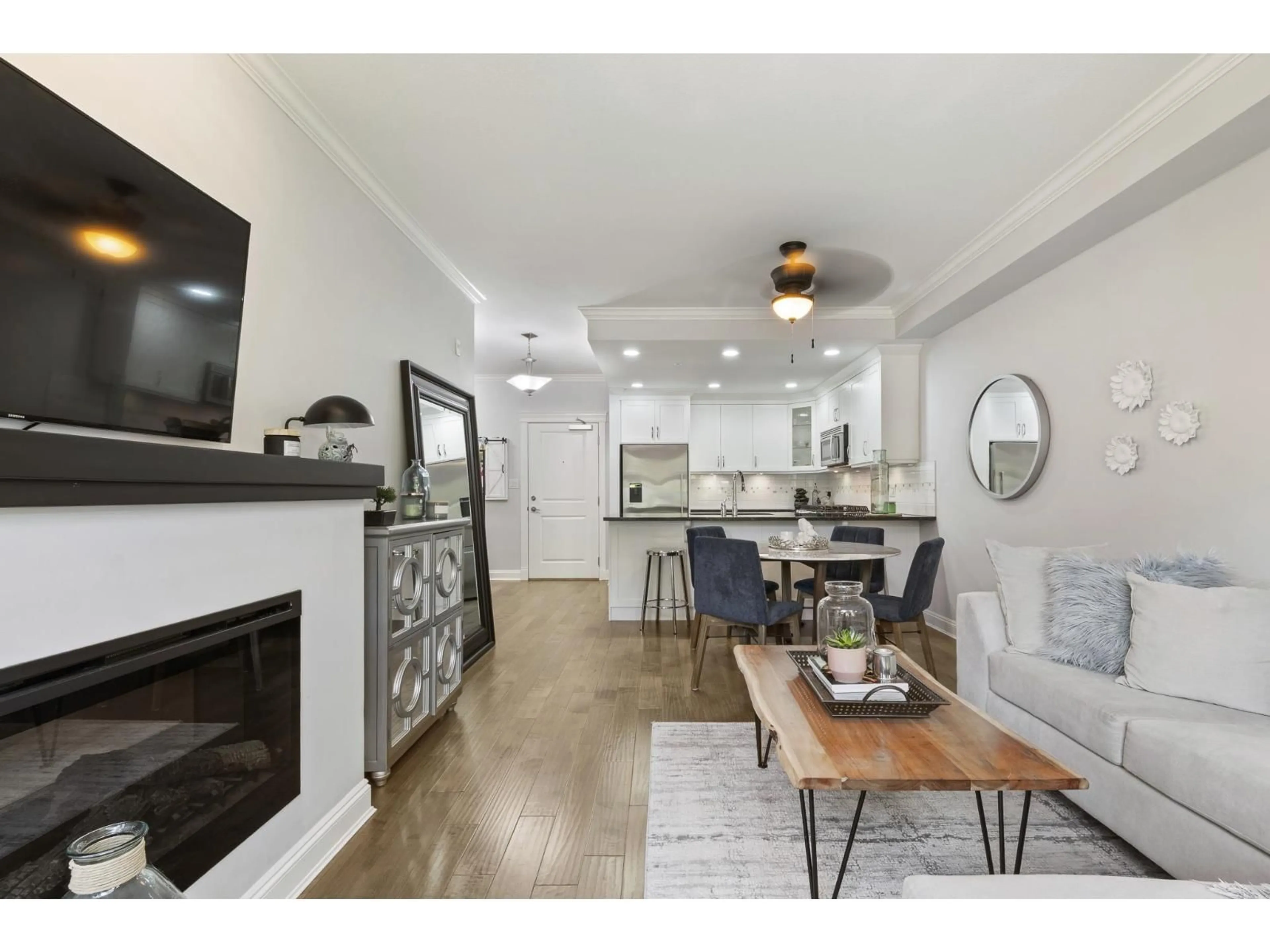 Open concept kitchen, wood/laminate floor for 106 - 15310 17A AVENUE, Surrey British Columbia V4A1V3