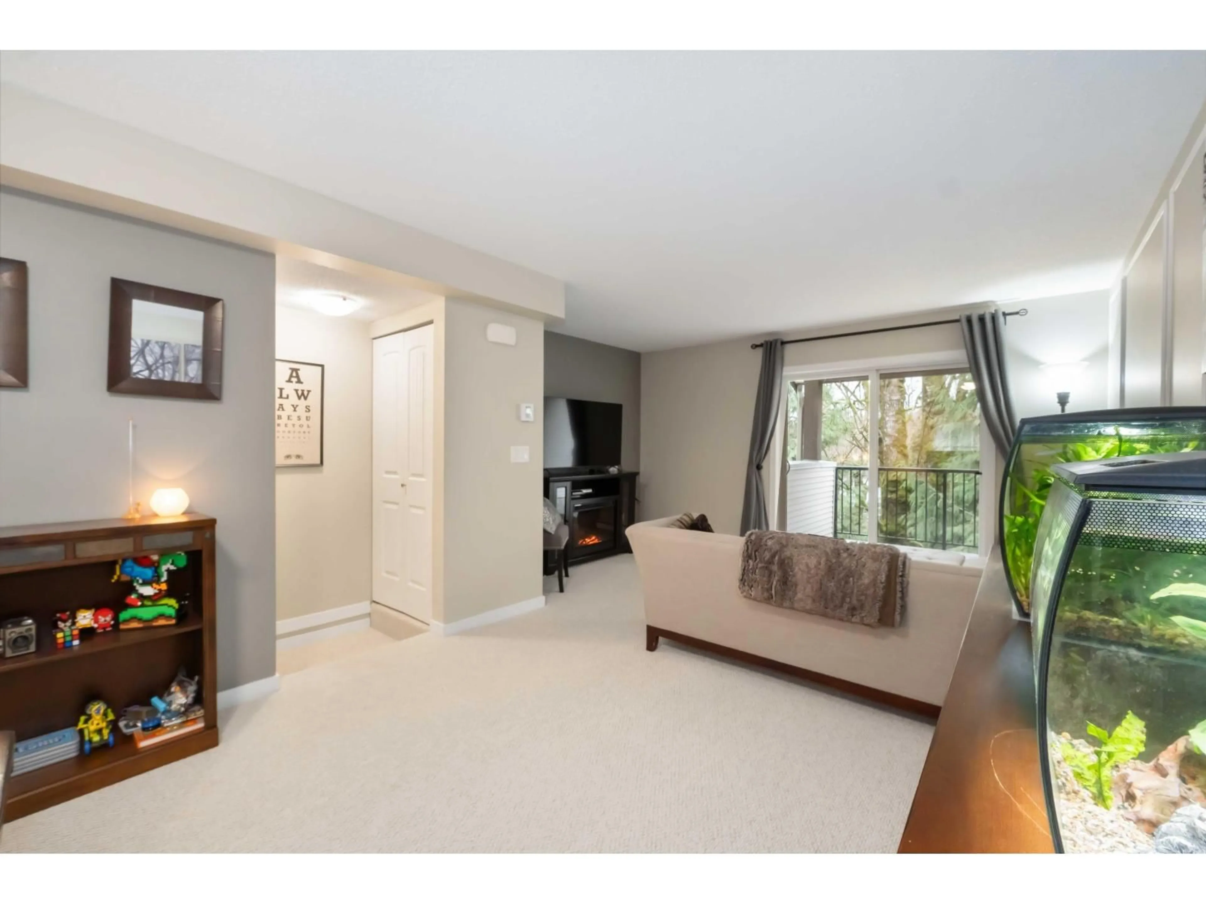 Living room with furniture, unknown for 112 - 4401 BLAUSON BOULEVARD, Abbotsford British Columbia V3G0A4