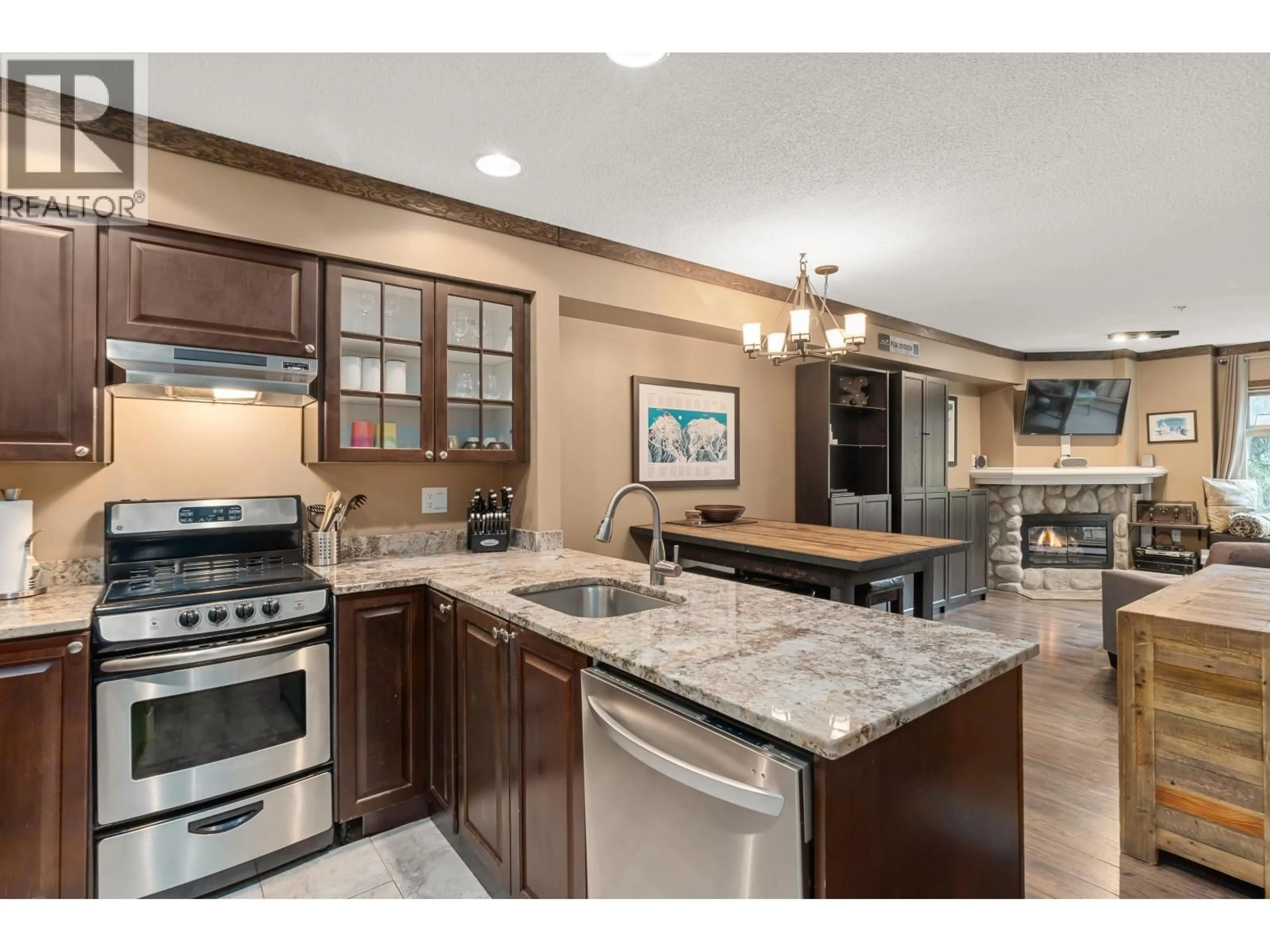 Open concept kitchen, ceramic/tile floor for 207 - 2050 LAKE PLACID ROAD, Whistler British Columbia V8E0A8