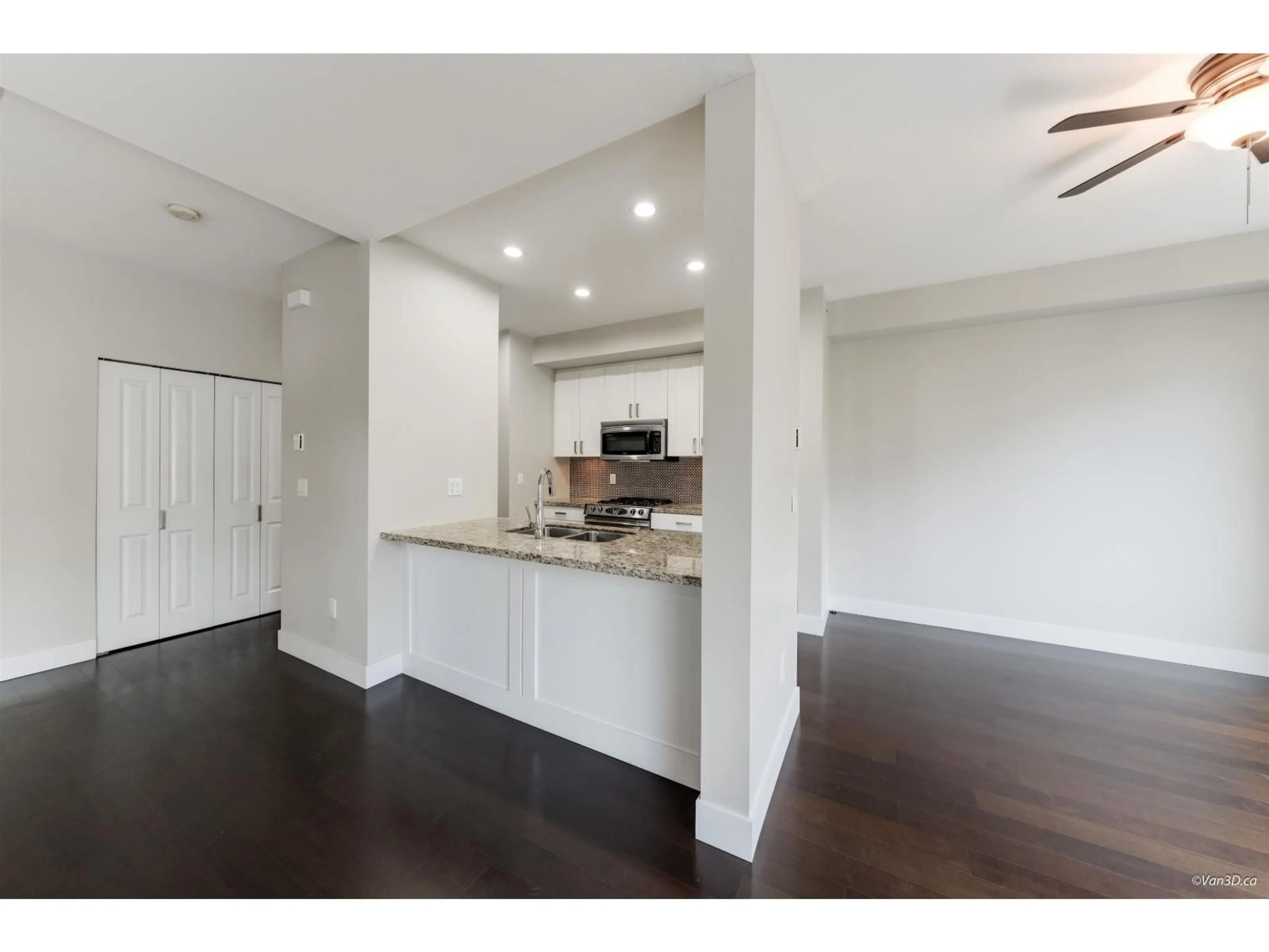 Open concept kitchen, wood/laminate floor for 213 - 2501 161A STREET, Surrey British Columbia V3Z7Y6