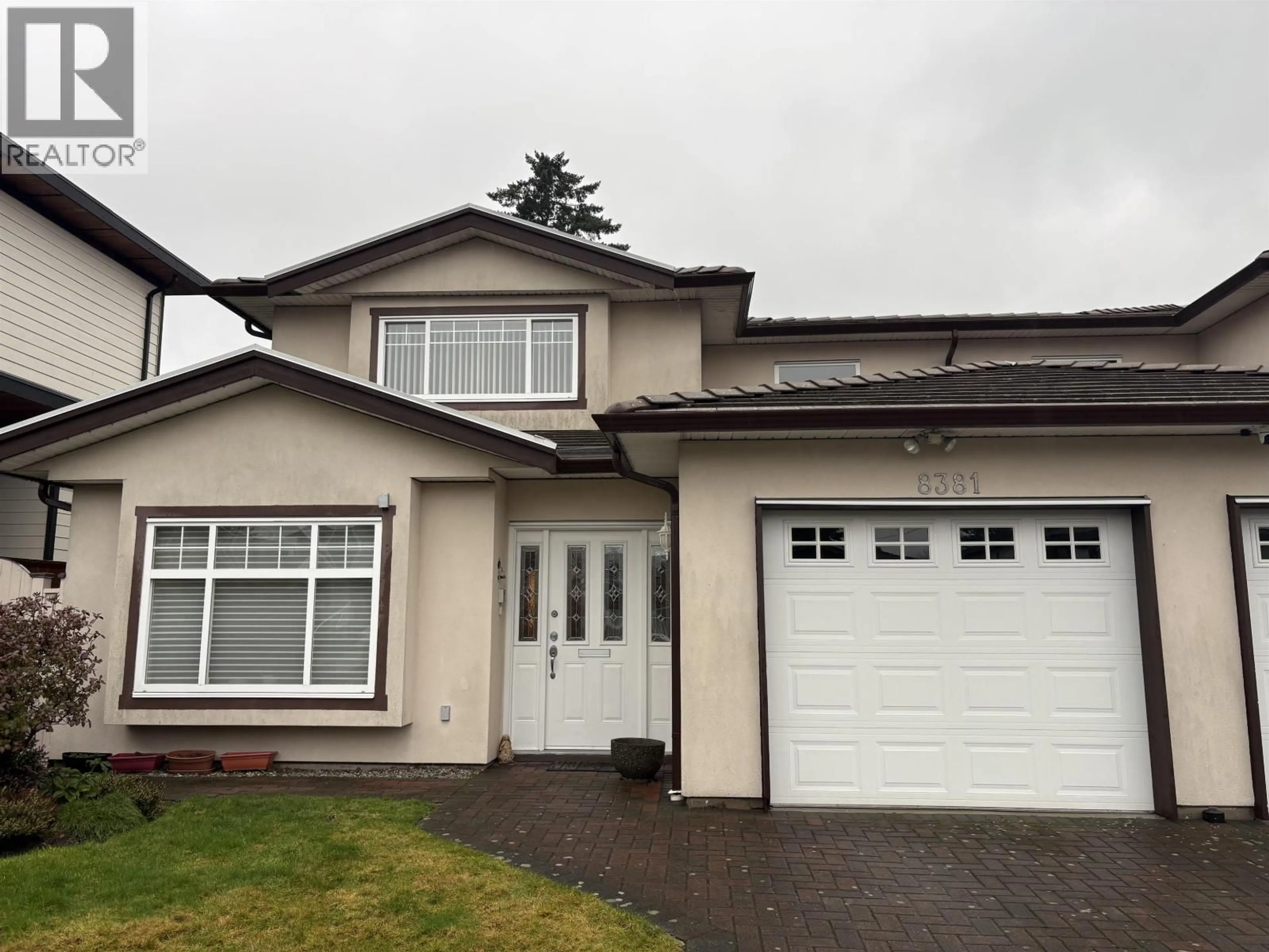 Home with vinyl exterior material, street for 8381 14TH AVENUE, Burnaby British Columbia V3N2C2