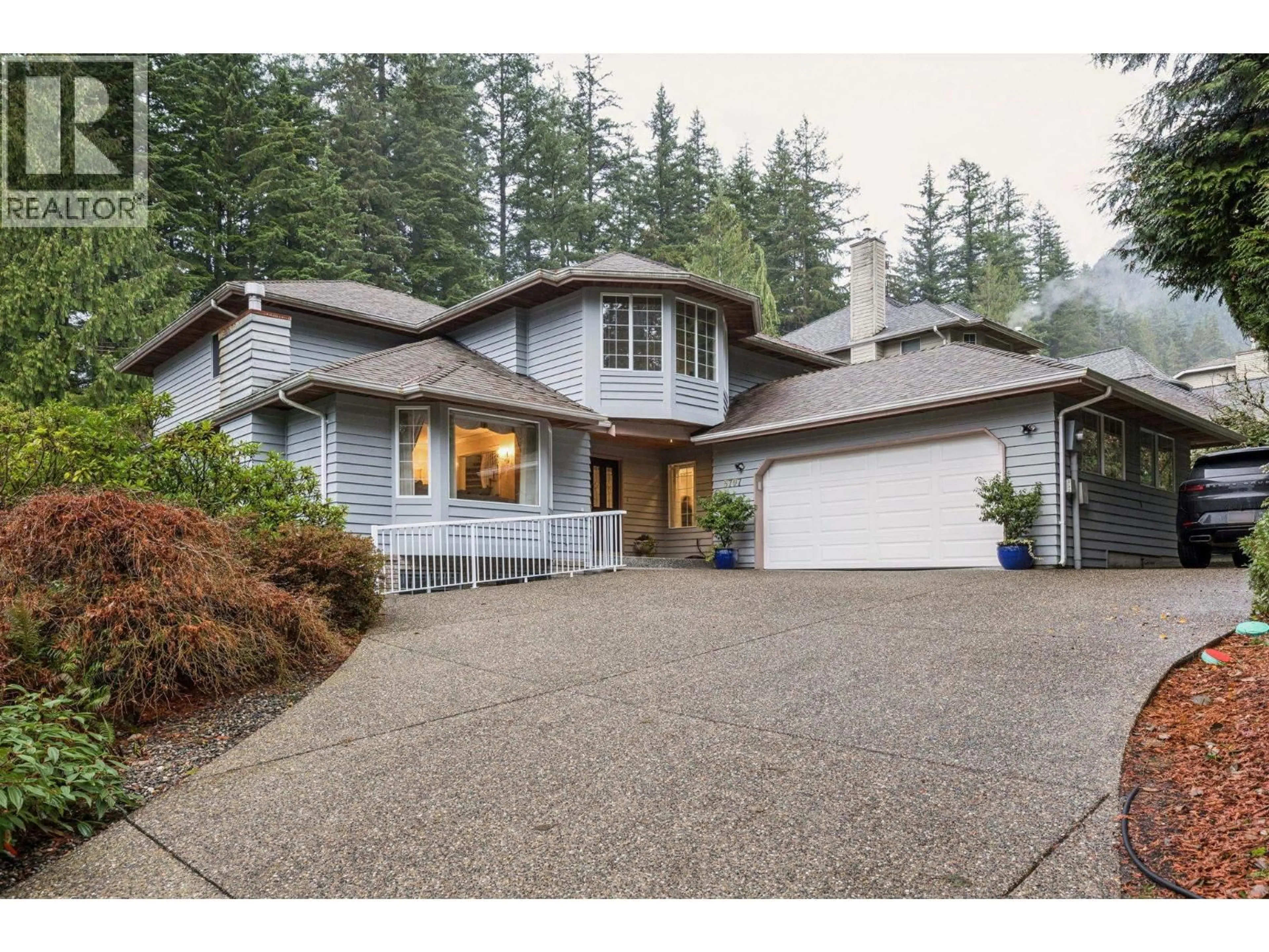 Home with vinyl exterior material, street for 5707 NANCY GREENE WAY, North Vancouver British Columbia V7R4W3