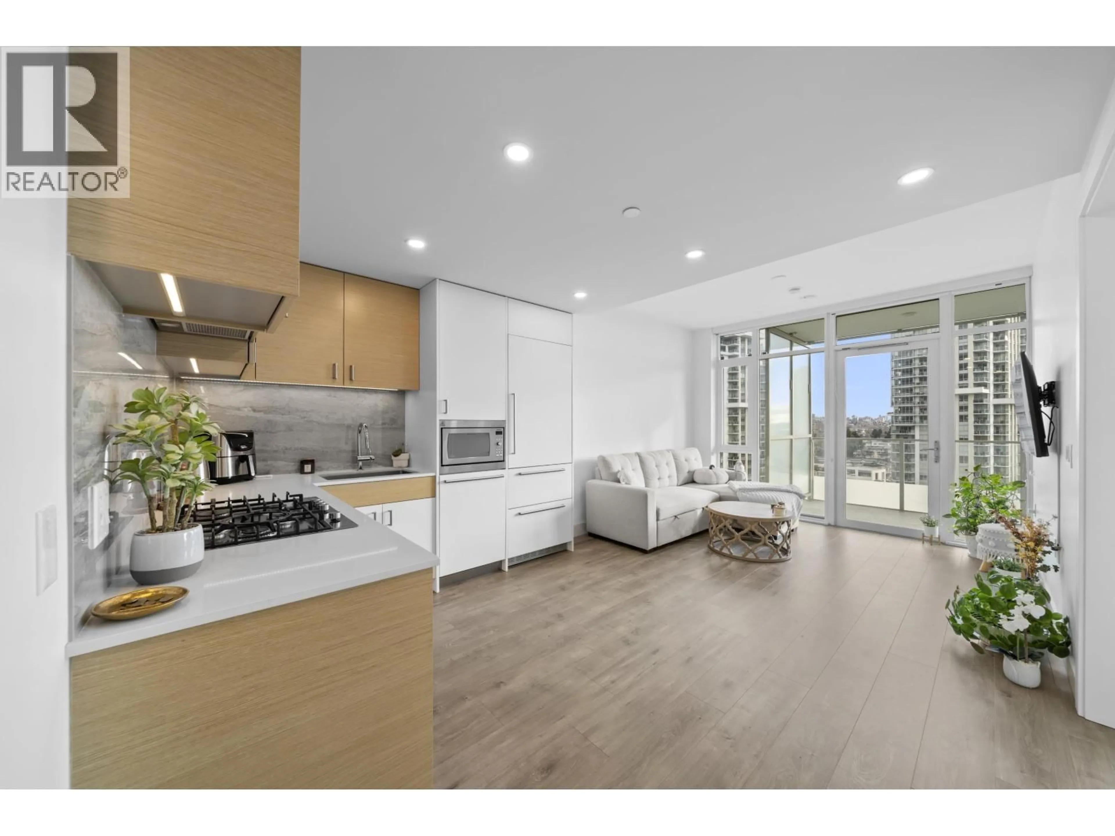 Open concept kitchen, unknown for 1003 - 200 KLAHANIE COURT, West Vancouver British Columbia V7P0E4