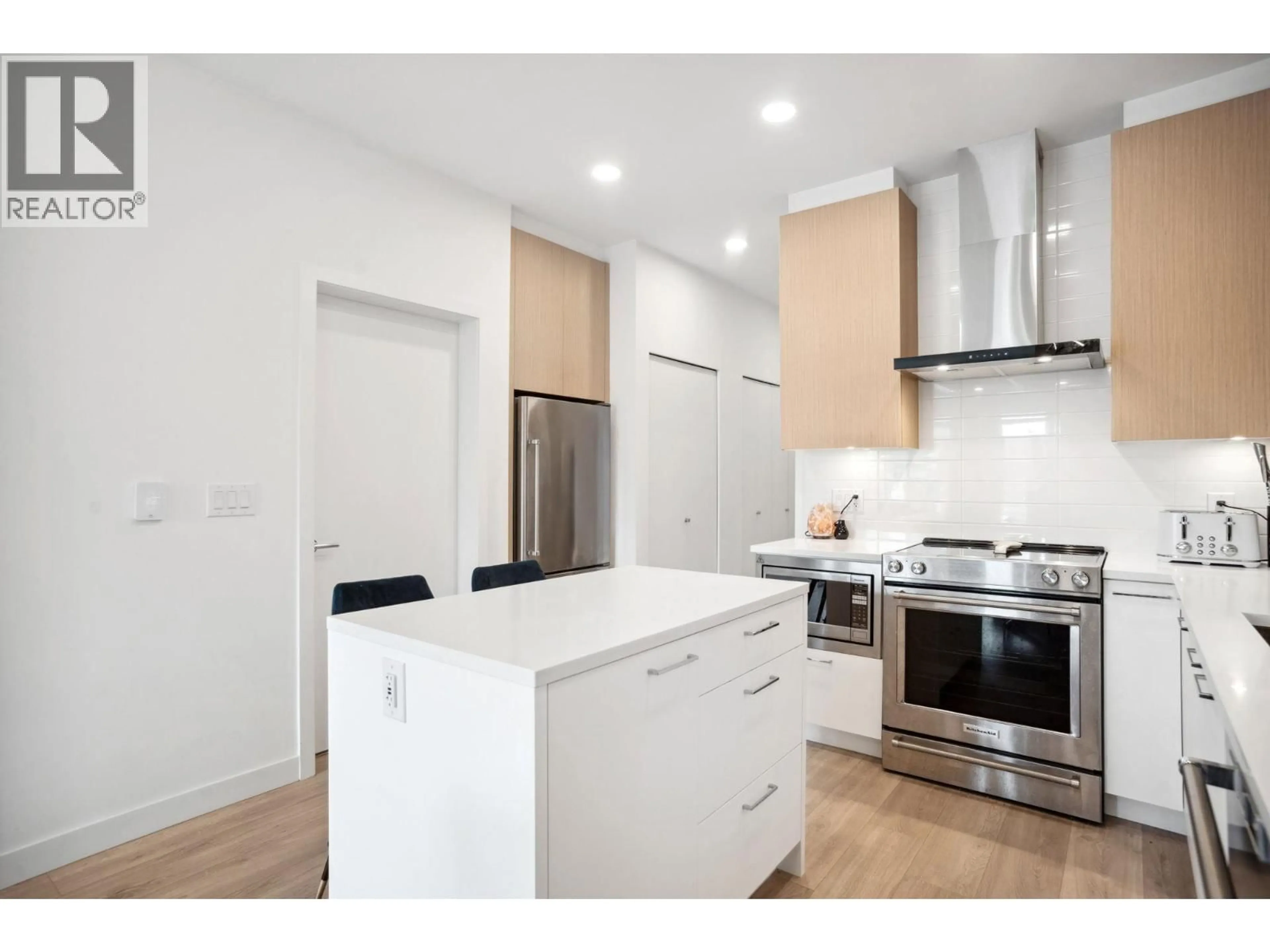 Contemporary kitchen, wood/laminate floor for 420 - 7599 15TH STREET, Burnaby British Columbia V3N0H9