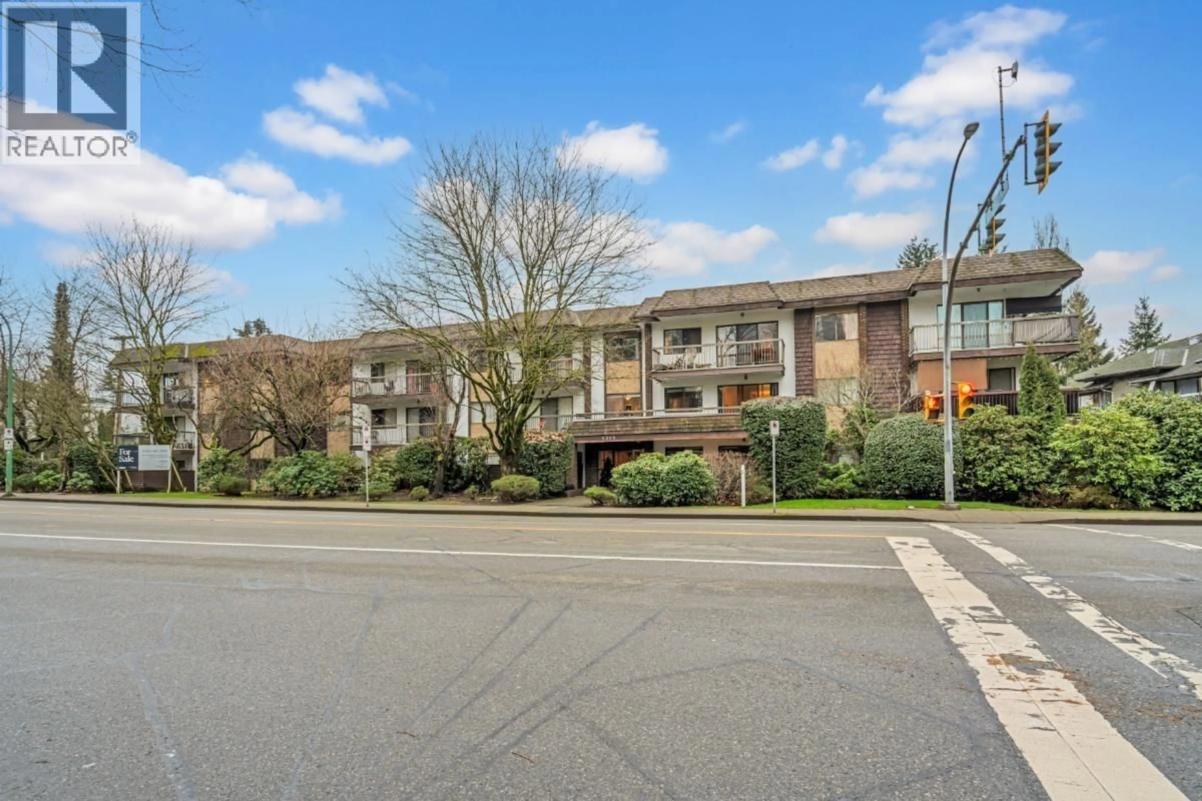 A pic from outside/outdoor area/front of a property/back of a property/a pic from drone, street for 103 - 4345 GRANGE STREET, Burnaby British Columbia V5H1P4