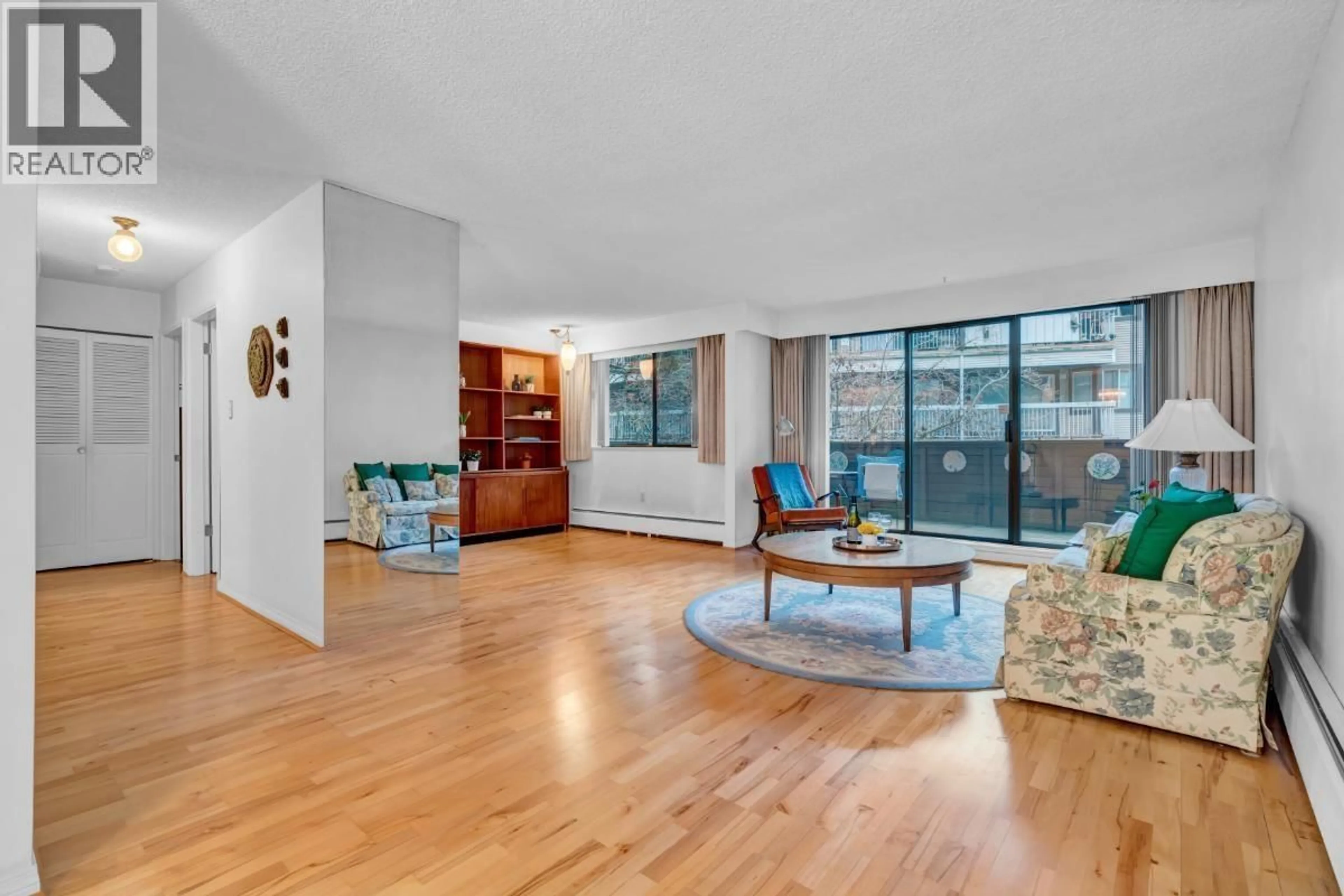 Living room with furniture, unknown for 103 - 4345 GRANGE STREET, Burnaby British Columbia V5H1P4