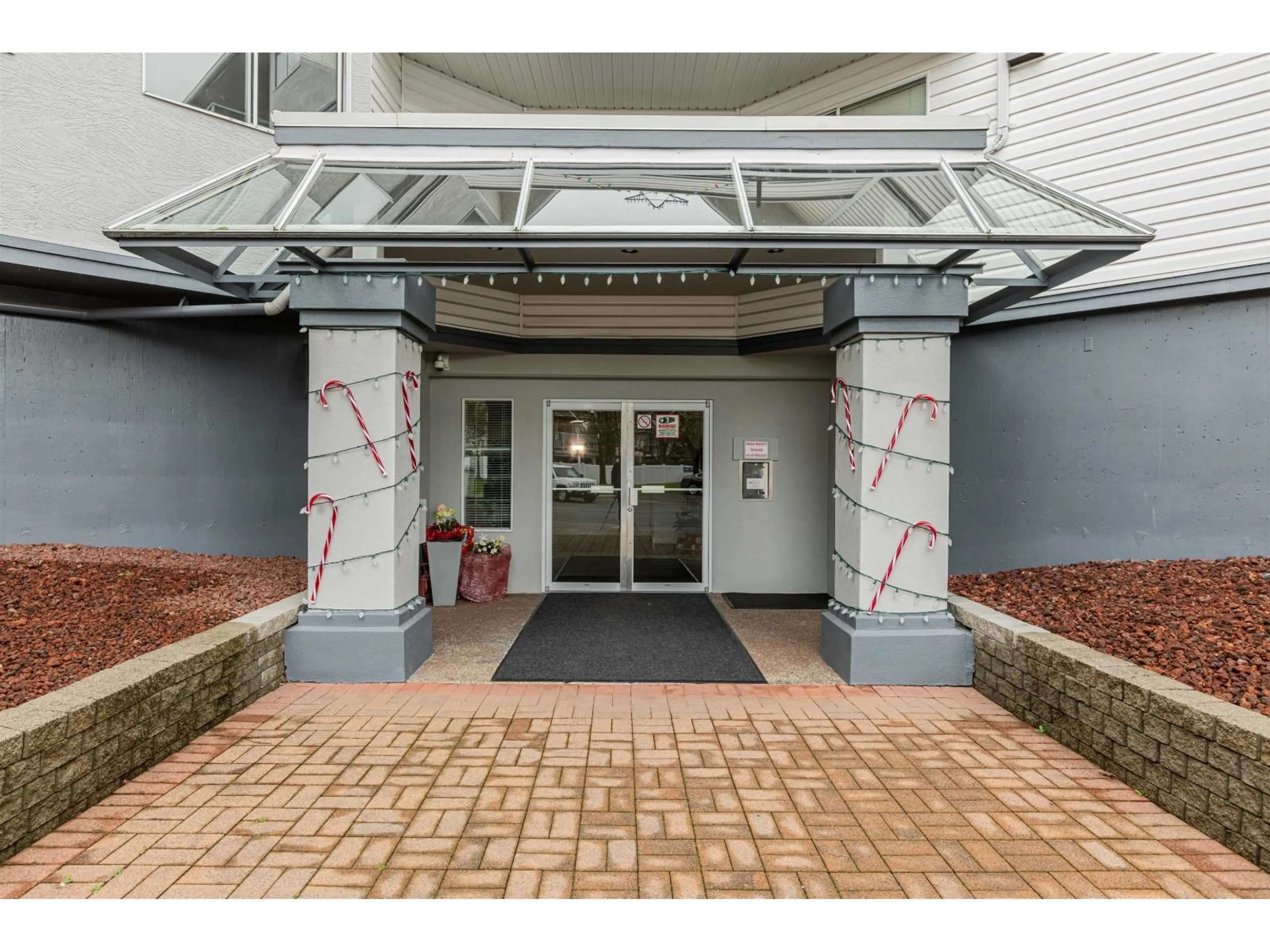 Indoor foyer for 205 - 5377 201A STREET, Langley British Columbia V3A1S7