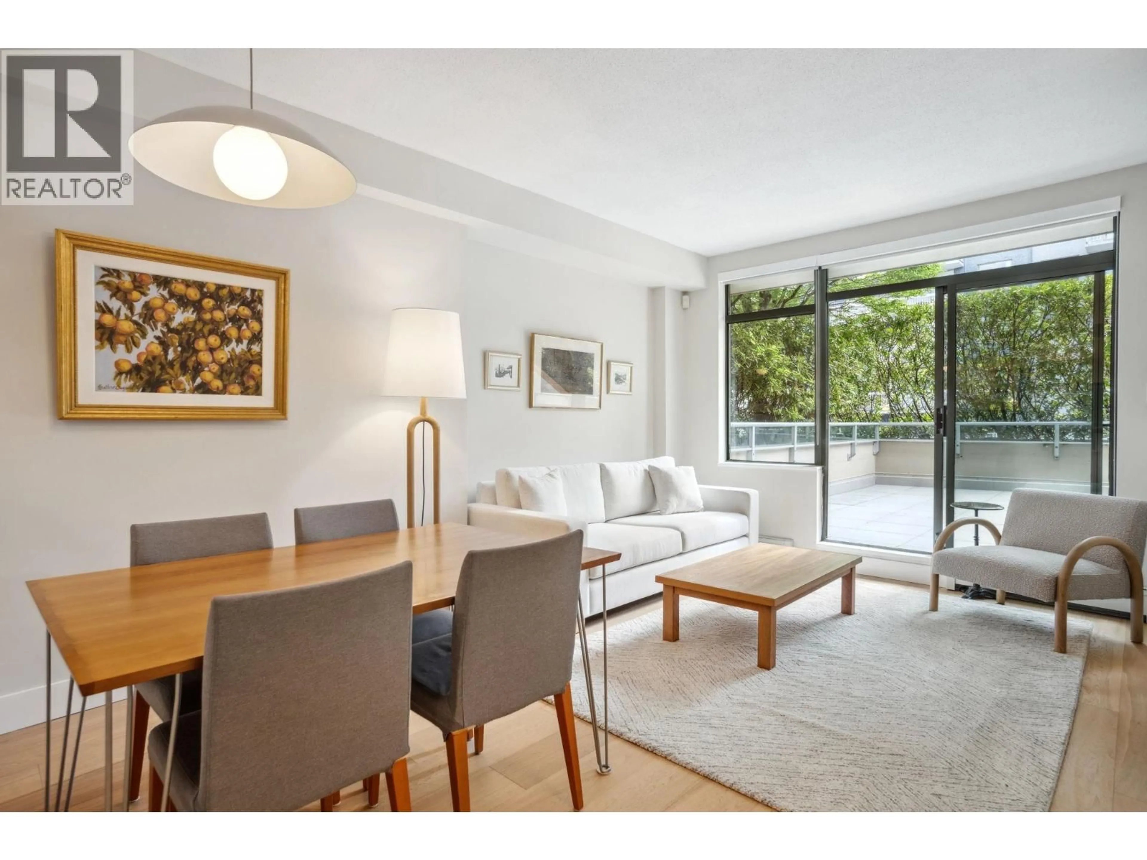 Living room with furniture, unknown for 100 - 1688 ROBSON STREET, Vancouver British Columbia V6G1C7