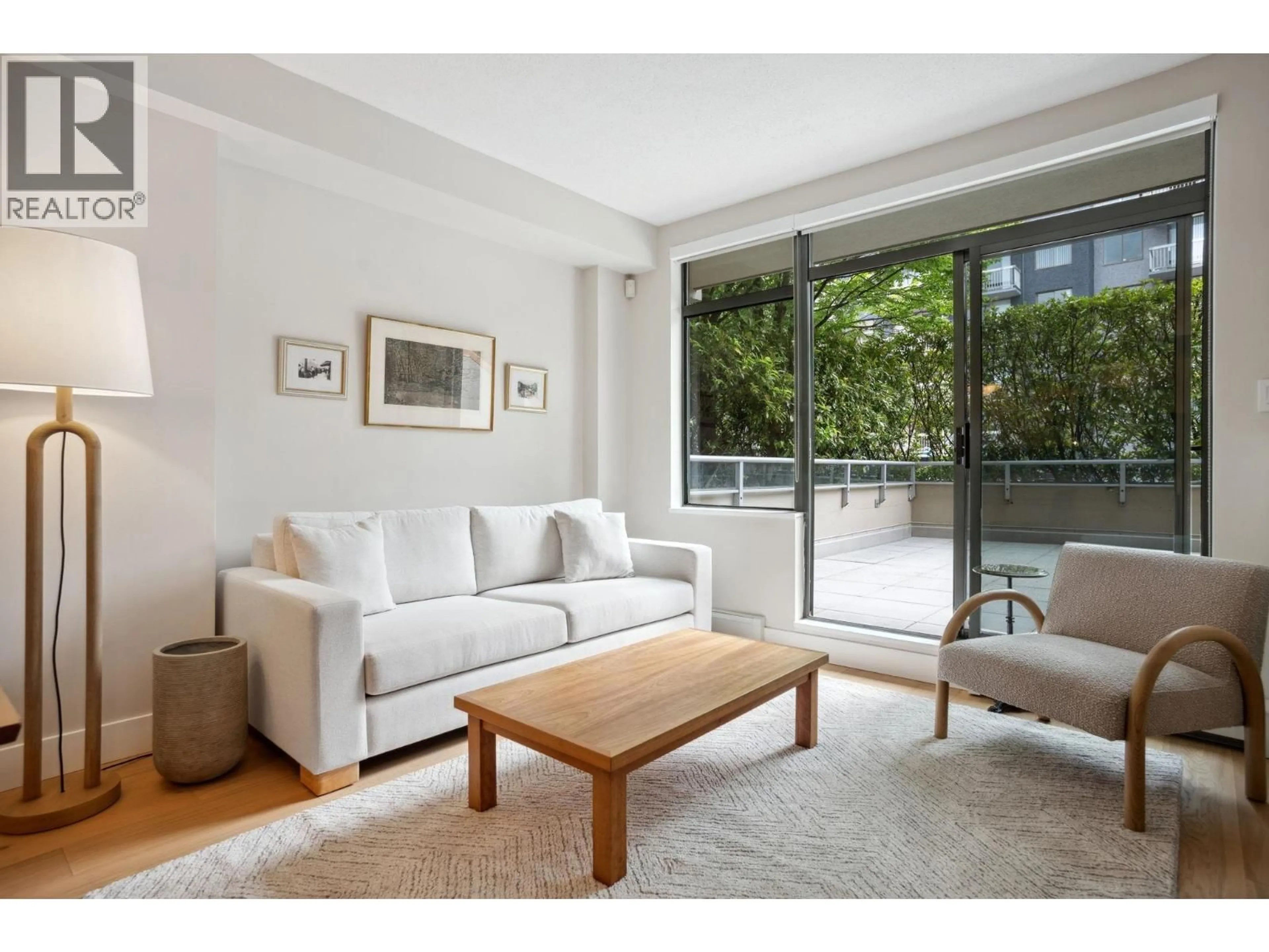 Living room with furniture, unknown for 100 - 1688 ROBSON STREET, Vancouver British Columbia V6G1C7