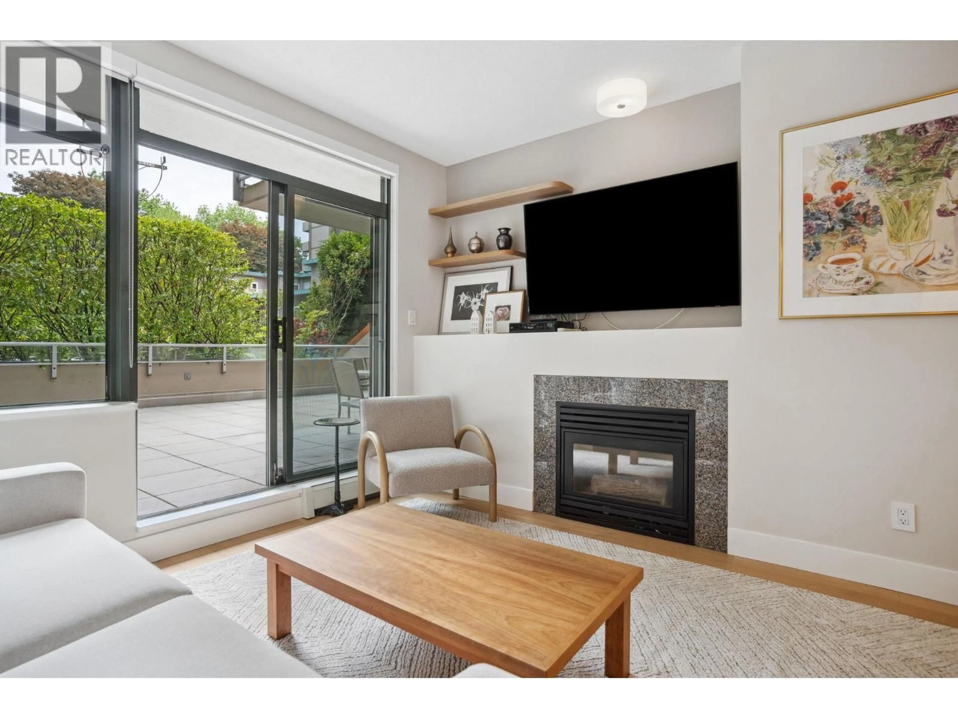 Living room with furniture, unknown for 100 - 1688 ROBSON STREET, Vancouver British Columbia V6G1C7