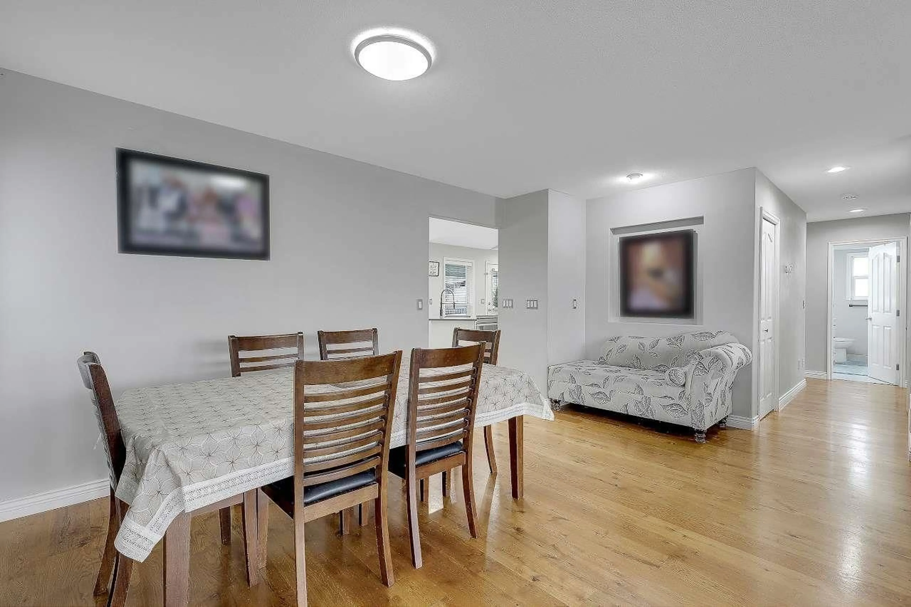 Dining room, wood/laminate floor for 27951 JUNCTION AVENUE, Abbotsford British Columbia V4X2R6