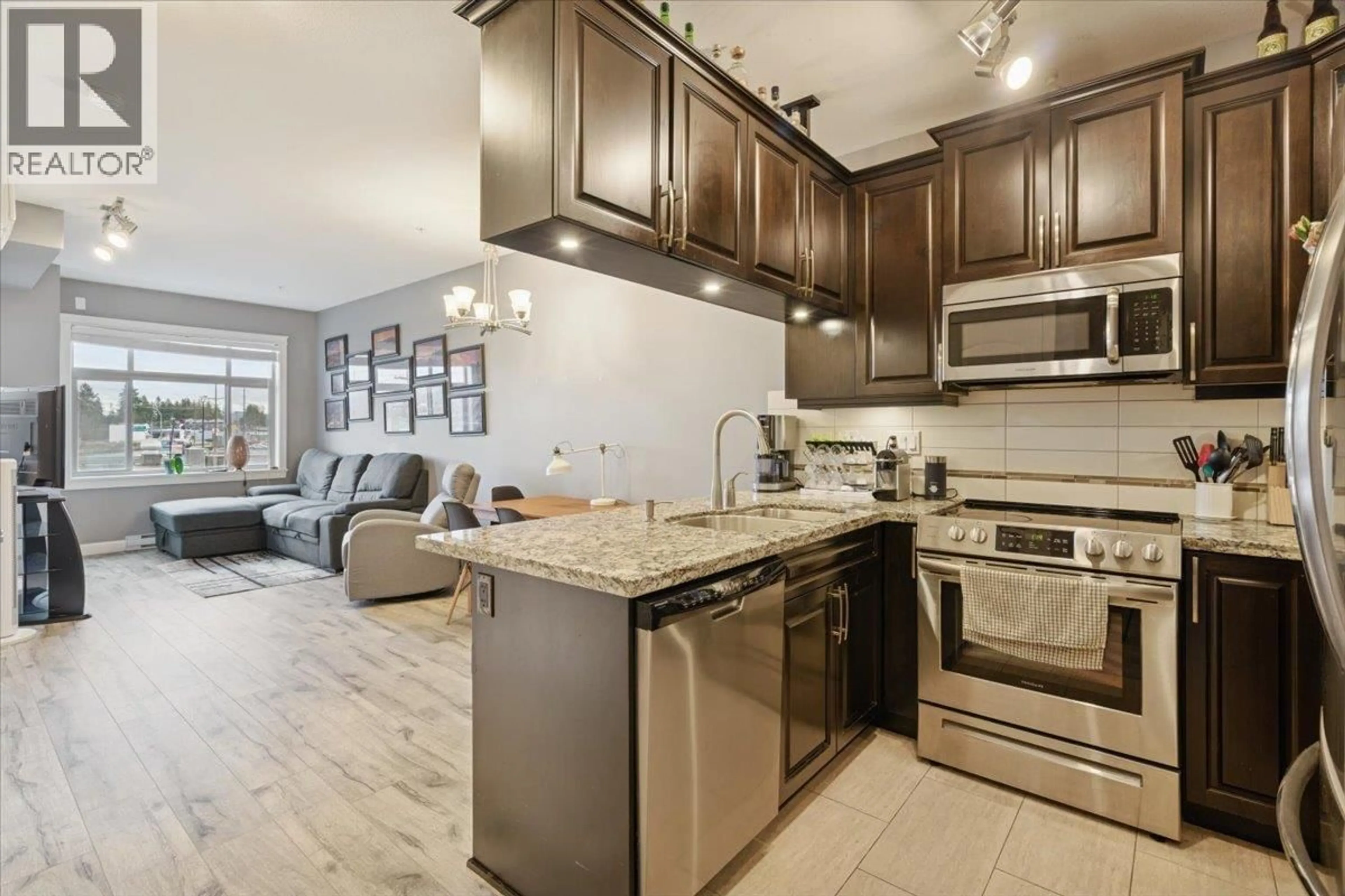 Open concept kitchen, ceramic/tile floor for 208 - 12655 190A STREET, Pitt Meadows British Columbia V3Y0E9