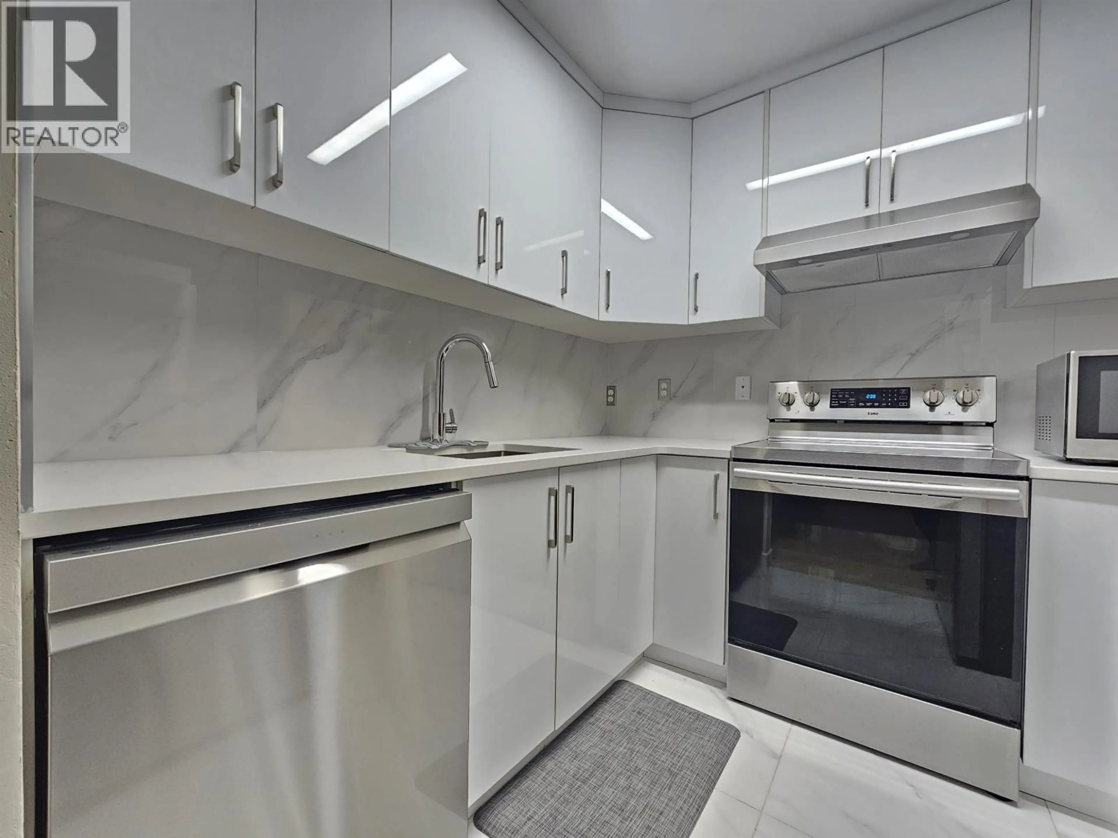 Standard kitchen, ceramic/tile floor for 201 - 3680 RAE AVENUE, Vancouver British Columbia V5R2P5