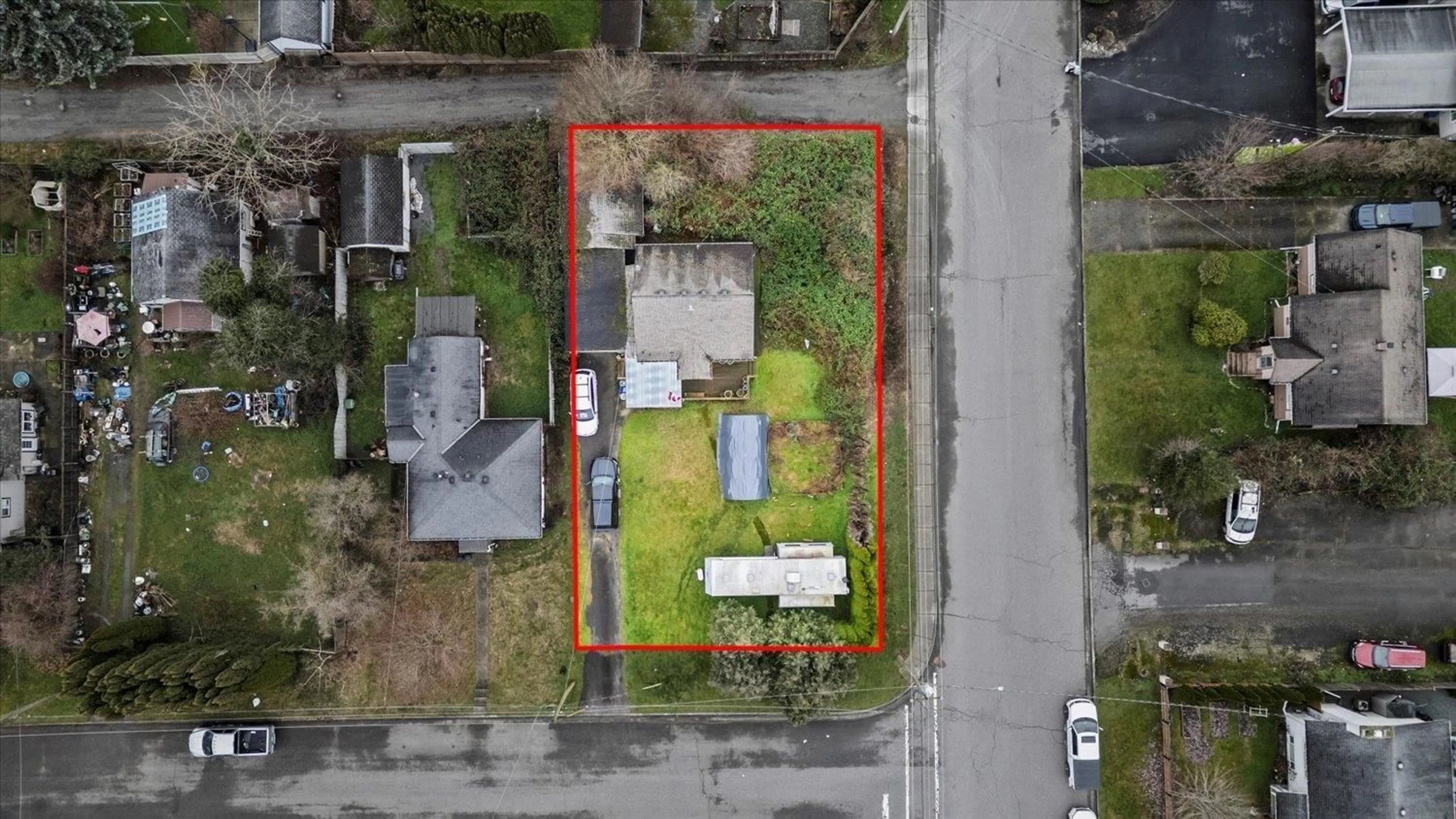 A pic from outside/outdoor area/front of a property/back of a property/a pic from drone, street for 46297 GORE AVENUE, Chilliwack British Columbia V2P2A2