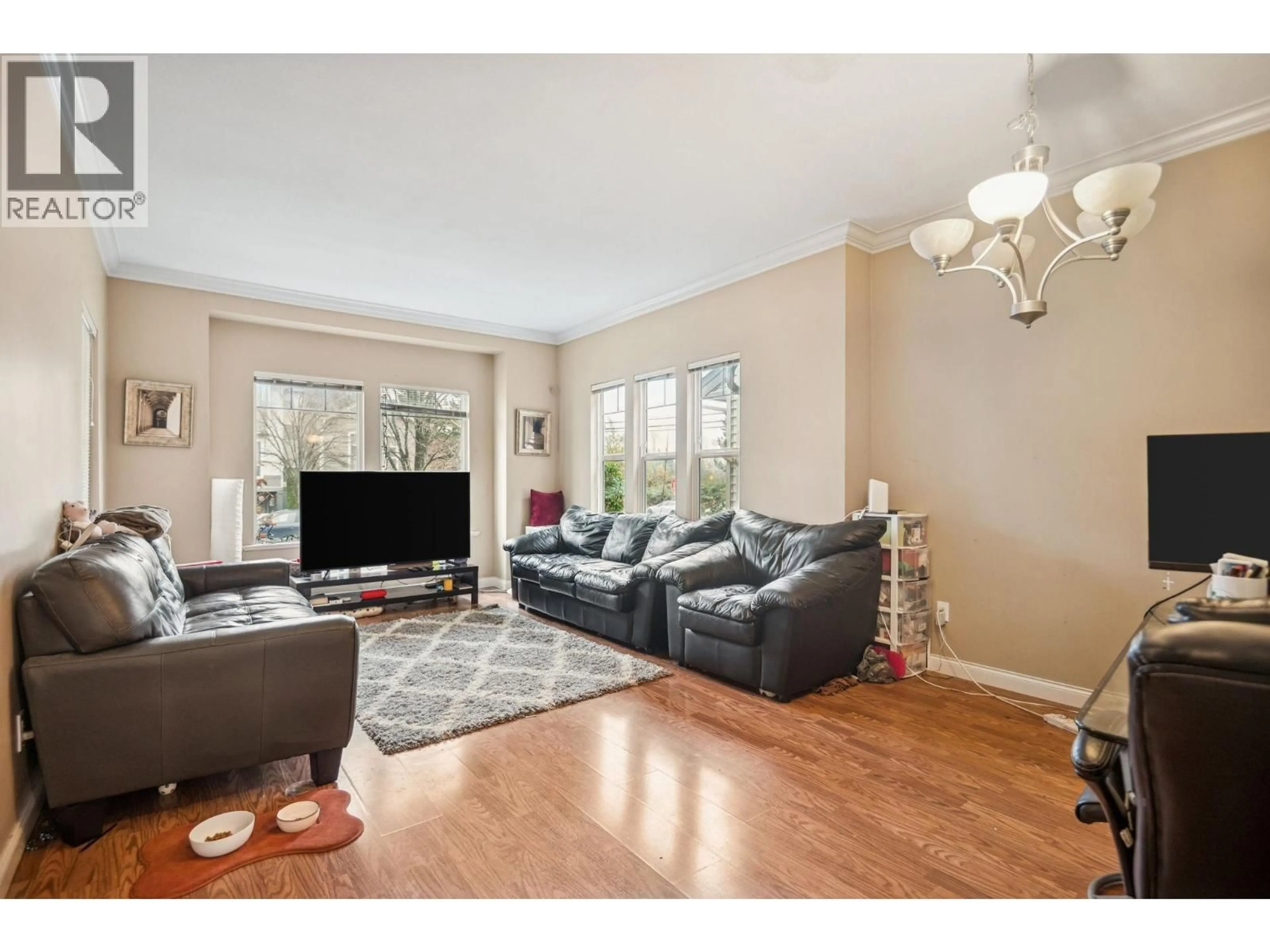 Living room with furniture, wood/laminate floor for 5951 MUIR DRIVE, Richmond British Columbia V6V3C4