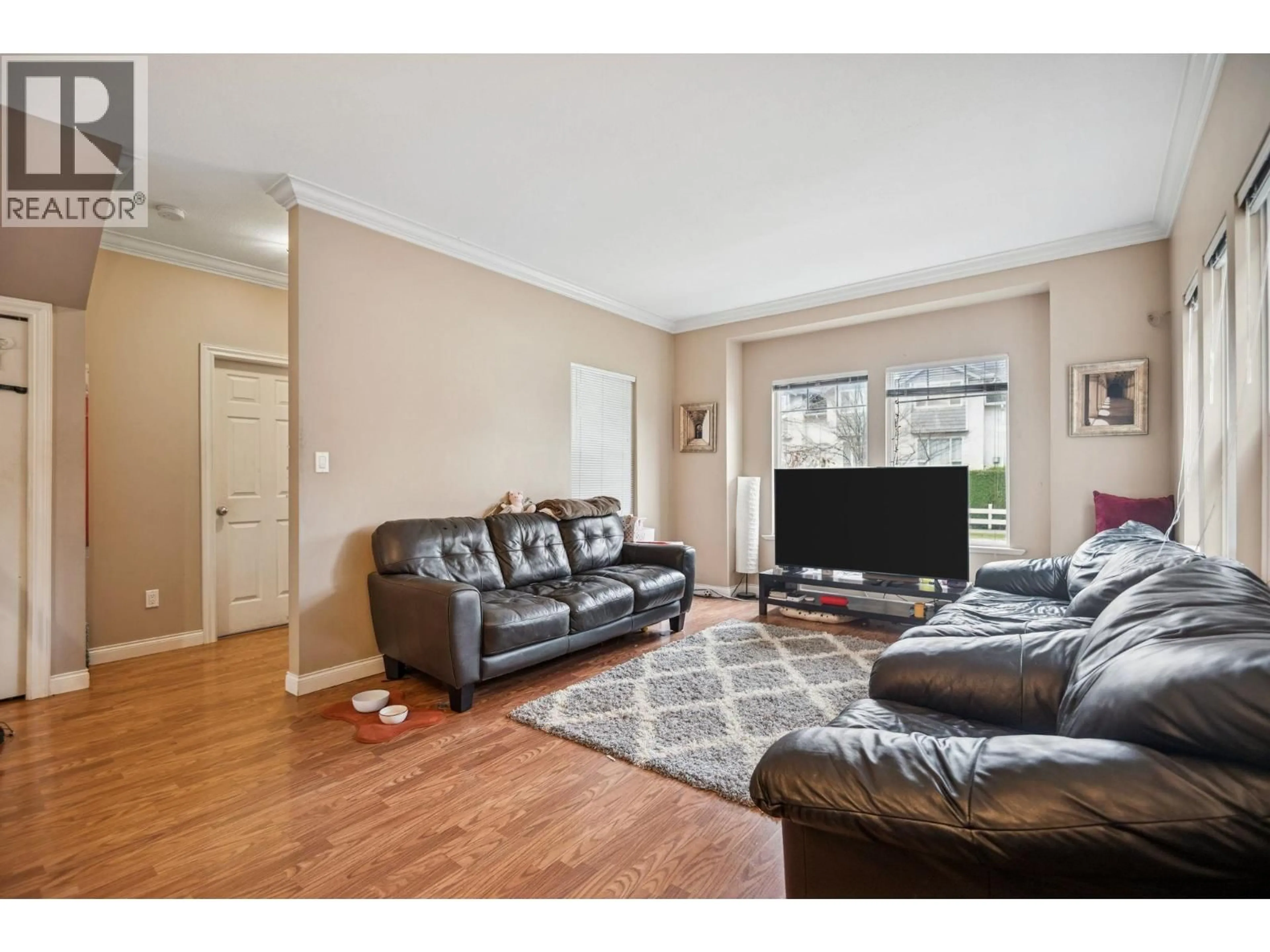 Living room with furniture, wood/laminate floor for 5951 MUIR DRIVE, Richmond British Columbia V6V3C4